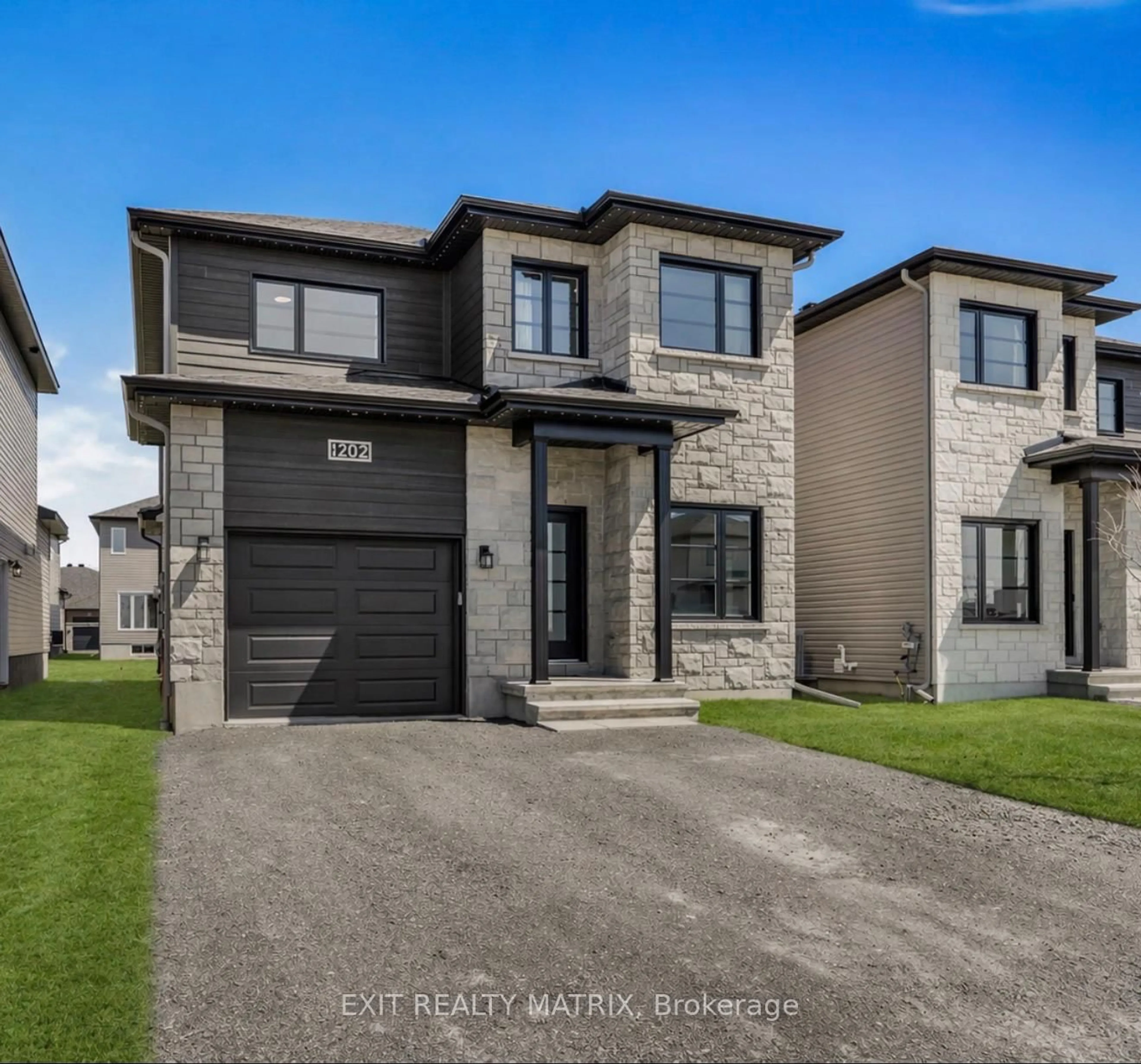 Home with brick exterior material, street for 1202 Montblanc Cres, Russell Ontario K0A 1W0
