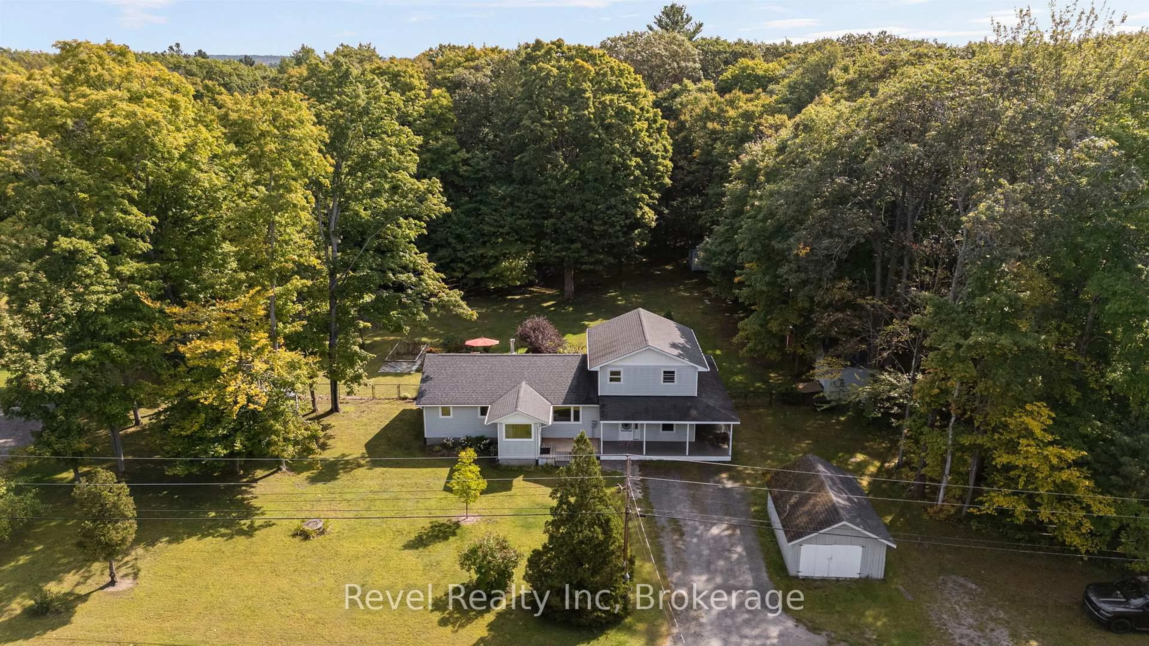 A pic from outside/outdoor area/front of a property/back of a property/a pic from drone, water/lake/river/ocean view for 19 Sandy Plains Rd, Seguin Ontario P2A 2W8