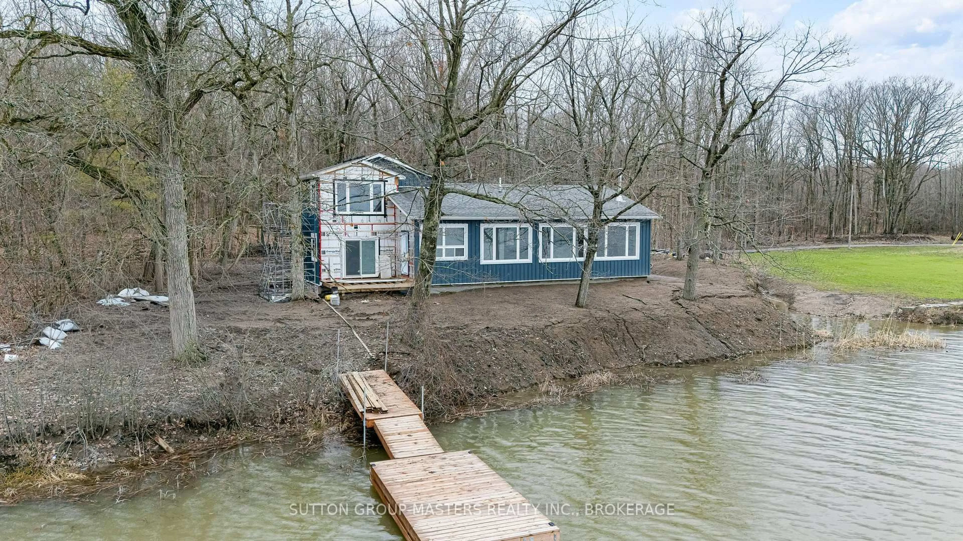 A pic from outside/outdoor area/front of a property/back of a property/a pic from drone, water/lake/river/ocean view for 99 Blue Heron Lane, Gananoque Ontario K7G 2V6