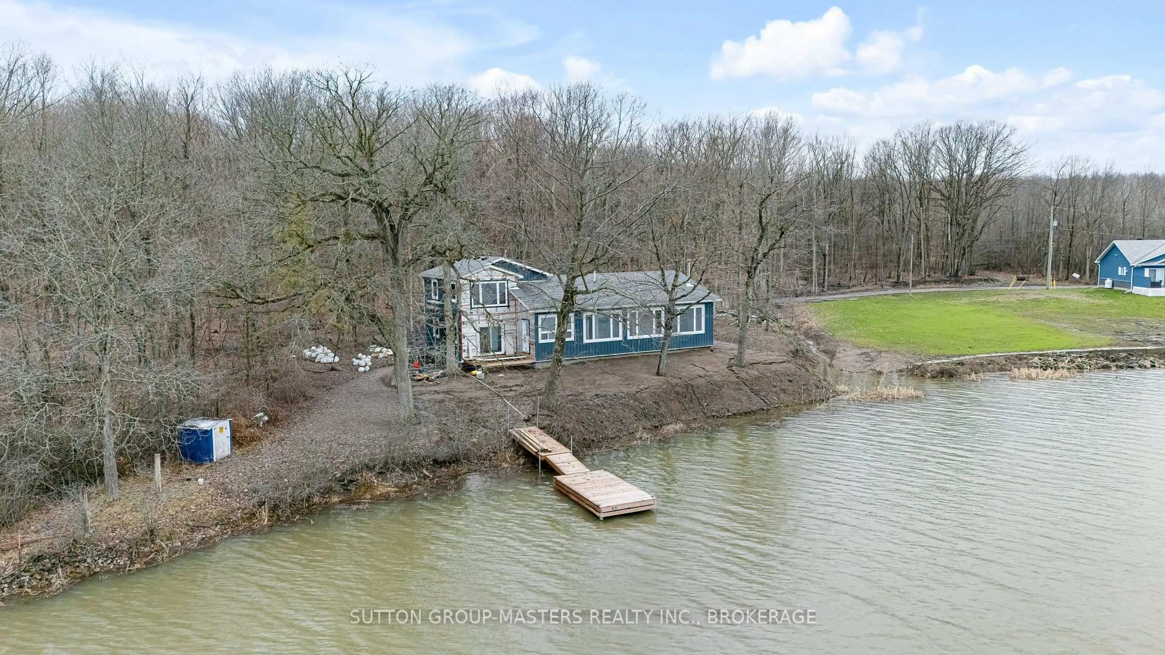 A pic from outside/outdoor area/front of a property/back of a property/a pic from drone, water/lake/river/ocean view for 99 Blue Heron Lane, Gananoque Ontario K7G 2V6