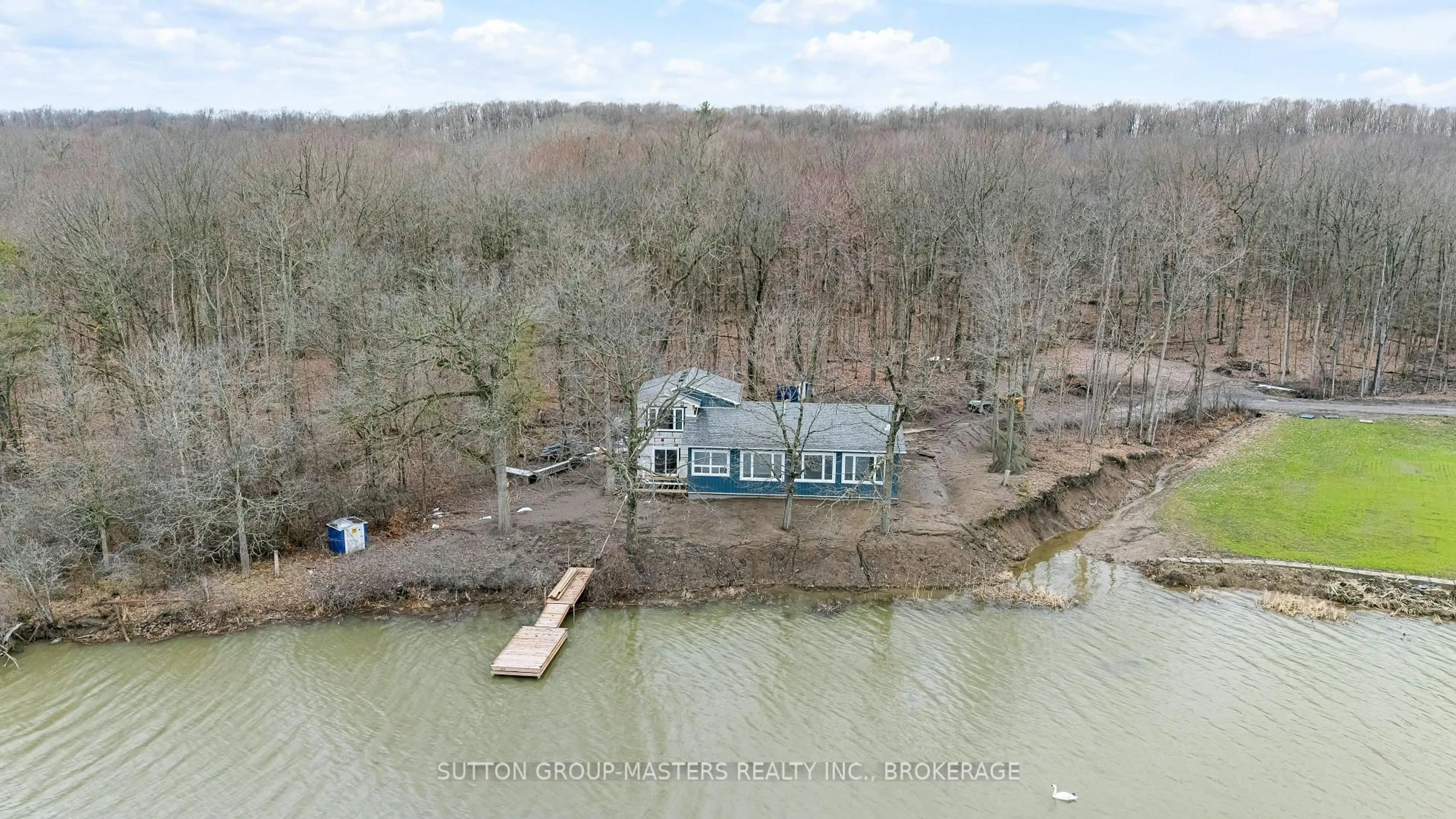 A pic from outside/outdoor area/front of a property/back of a property/a pic from drone, water/lake/river/ocean view for 99 Blue Heron Lane, Gananoque Ontario K7G 2V6