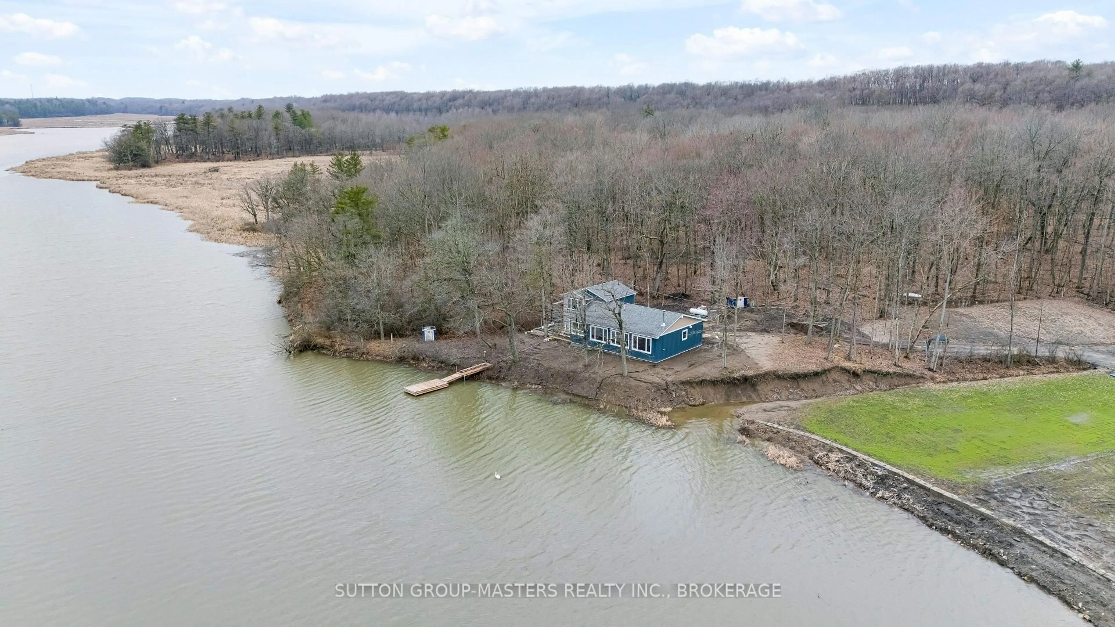 A pic from outside/outdoor area/front of a property/back of a property/a pic from drone, water/lake/river/ocean view for 99 Blue Heron Lane, Gananoque Ontario K7G 2V6
