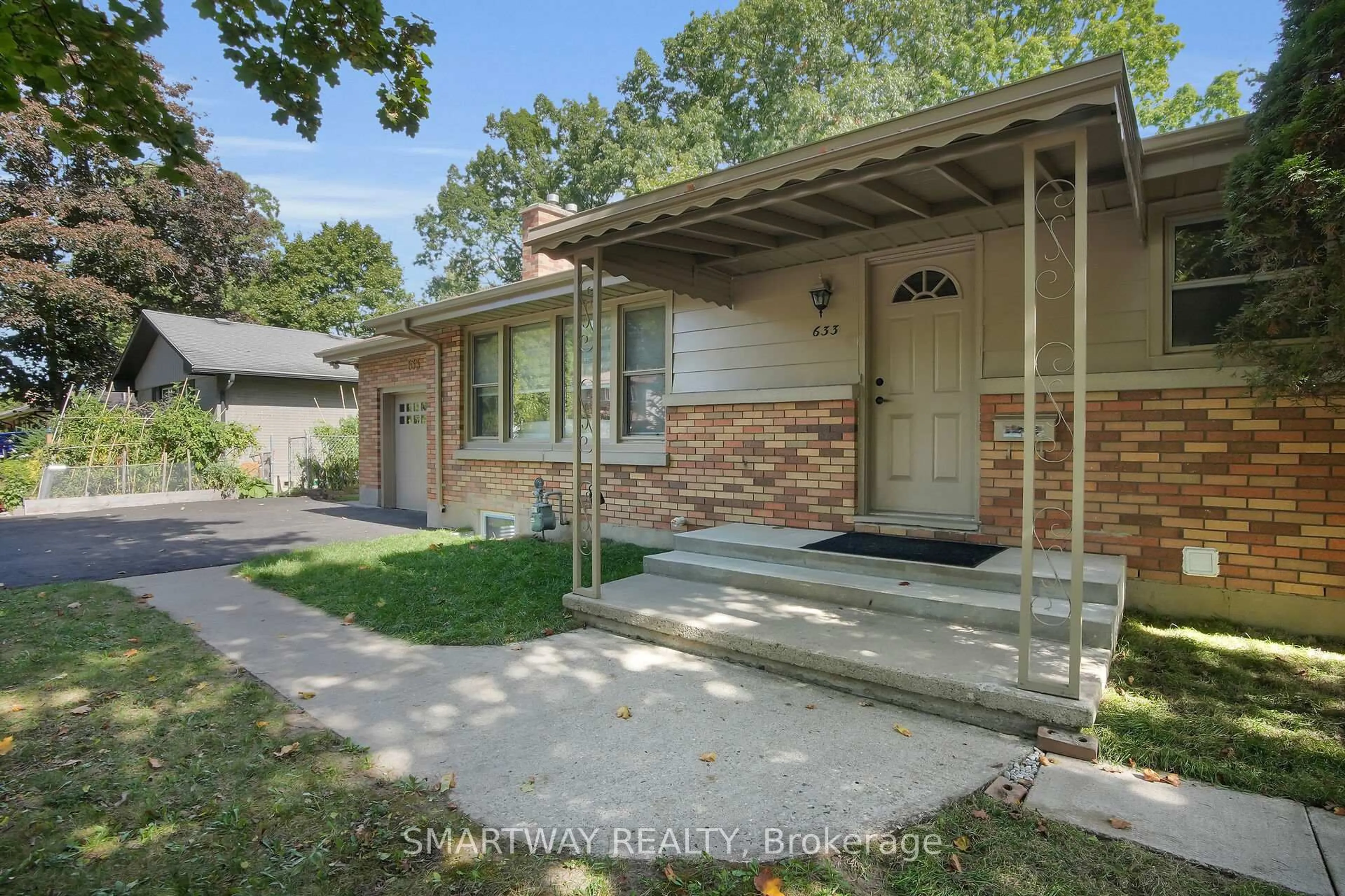 Home with brick exterior material, street for 633 Donegal Dr, London North Ontario N6H 3H6