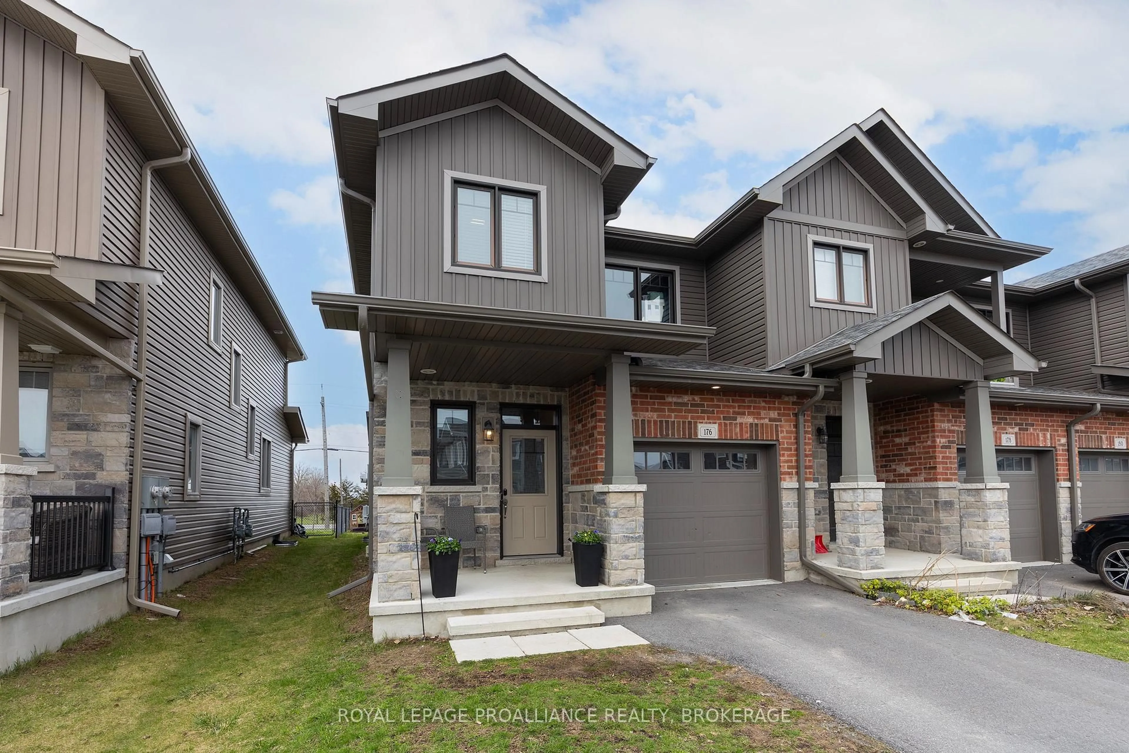 Home with brick exterior material, street for 176 Dr Richard James Cres, Loyalist Ontario K7N 0B9