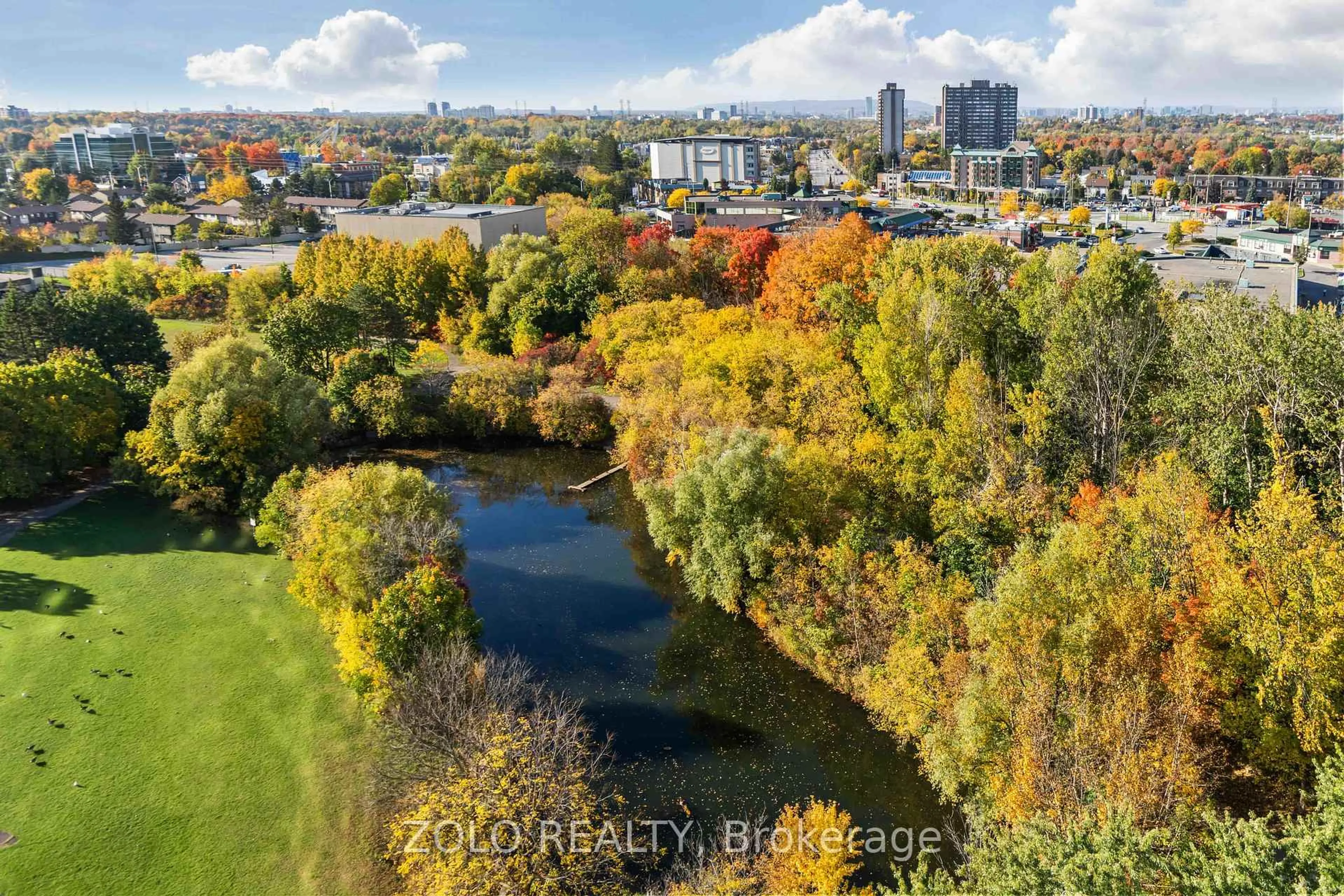 A pic from outside/outdoor area/front of a property/back of a property/a pic from drone, water/lake/river/ocean view for 2759 Carousel Cres #501, Ottawa Ontario K1T 2N5