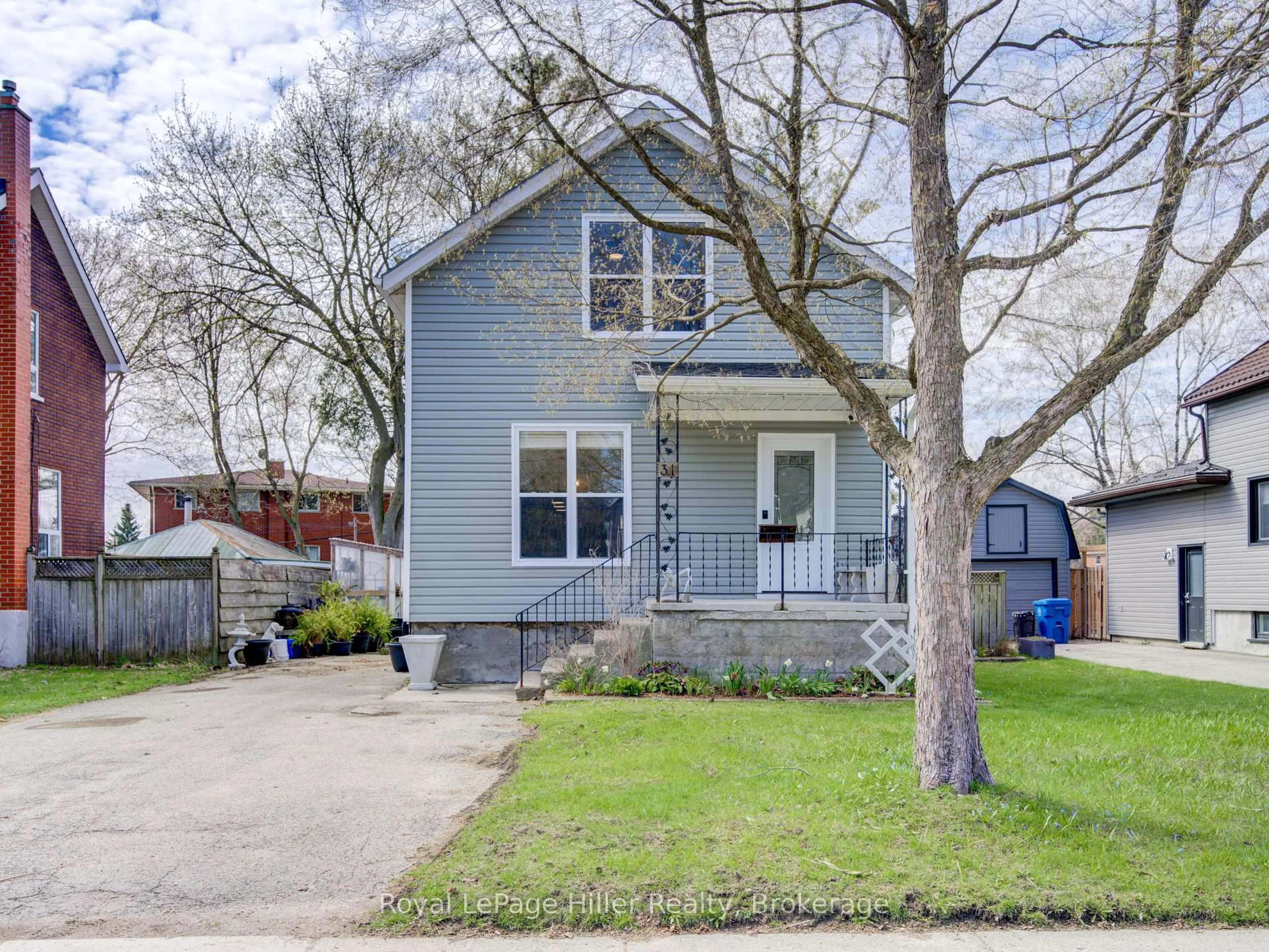 Home with vinyl exterior material, street for 31 Norfolk St, Stratford Ontario N5A 3Y6