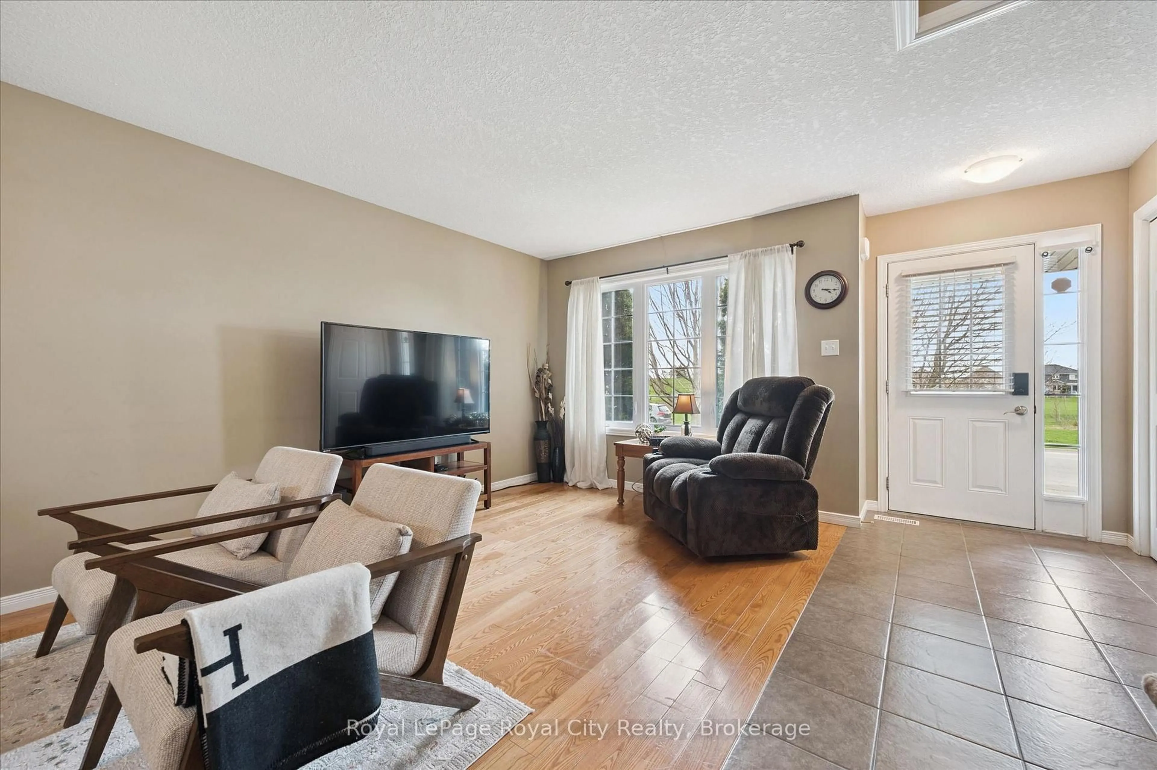 Living room with furniture, unknown for 105 Spencer Dr, Centre Wellington Ontario N0B 1S0