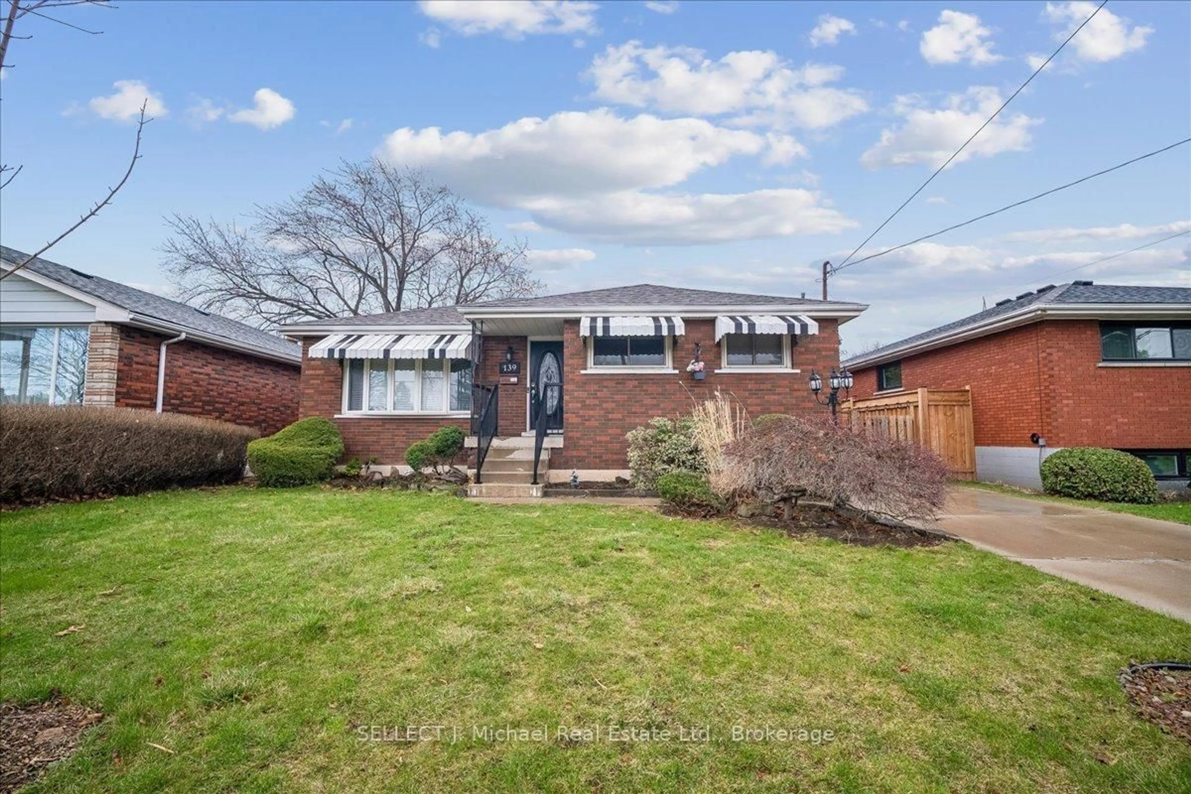 Home with brick exterior material, street for 139 Rendell Blvd, Hamilton Ontario L8T 3P7