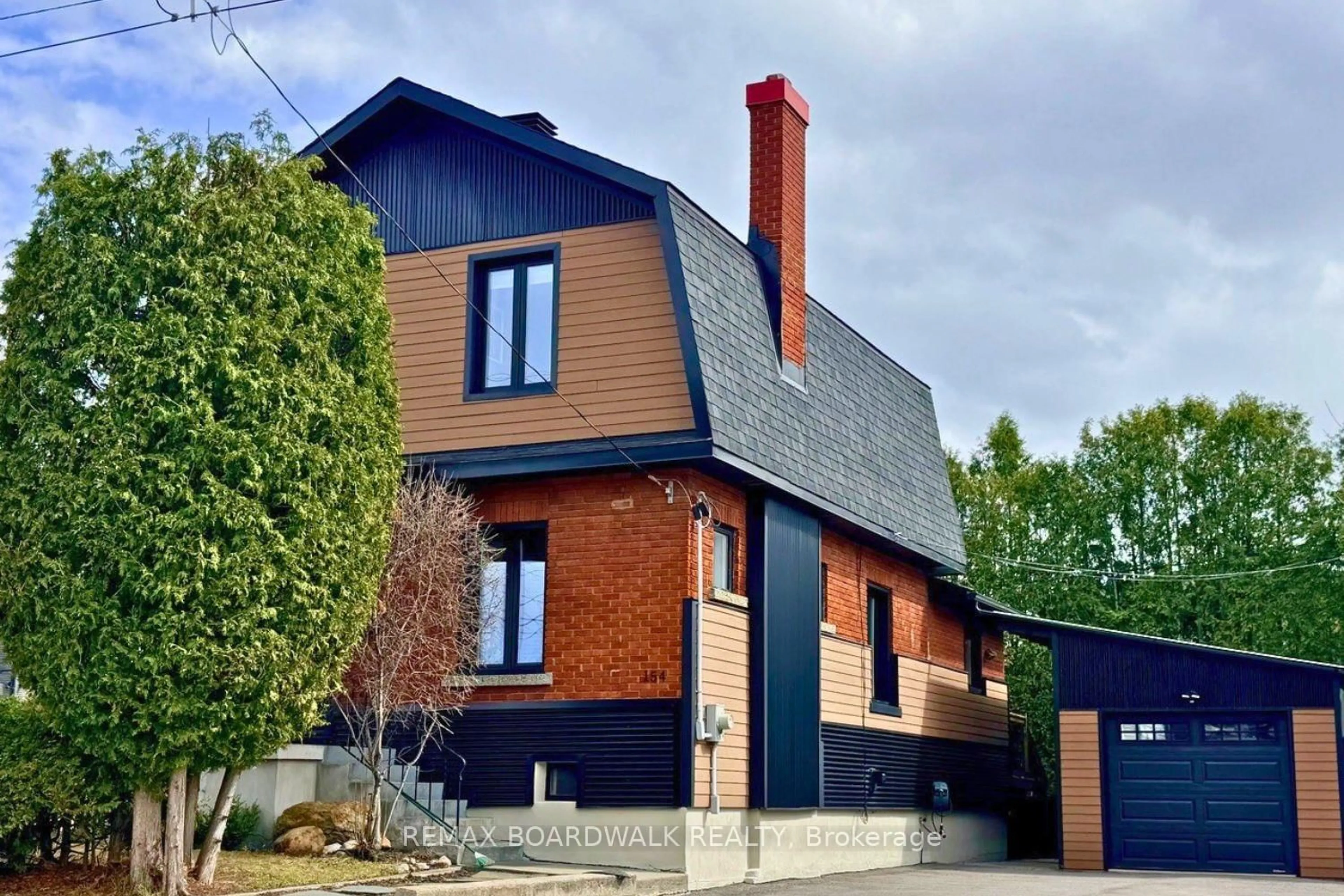 Home with brick exterior material, street for 154 Queen Mary St, Ottawa Ontario K1K 1X5