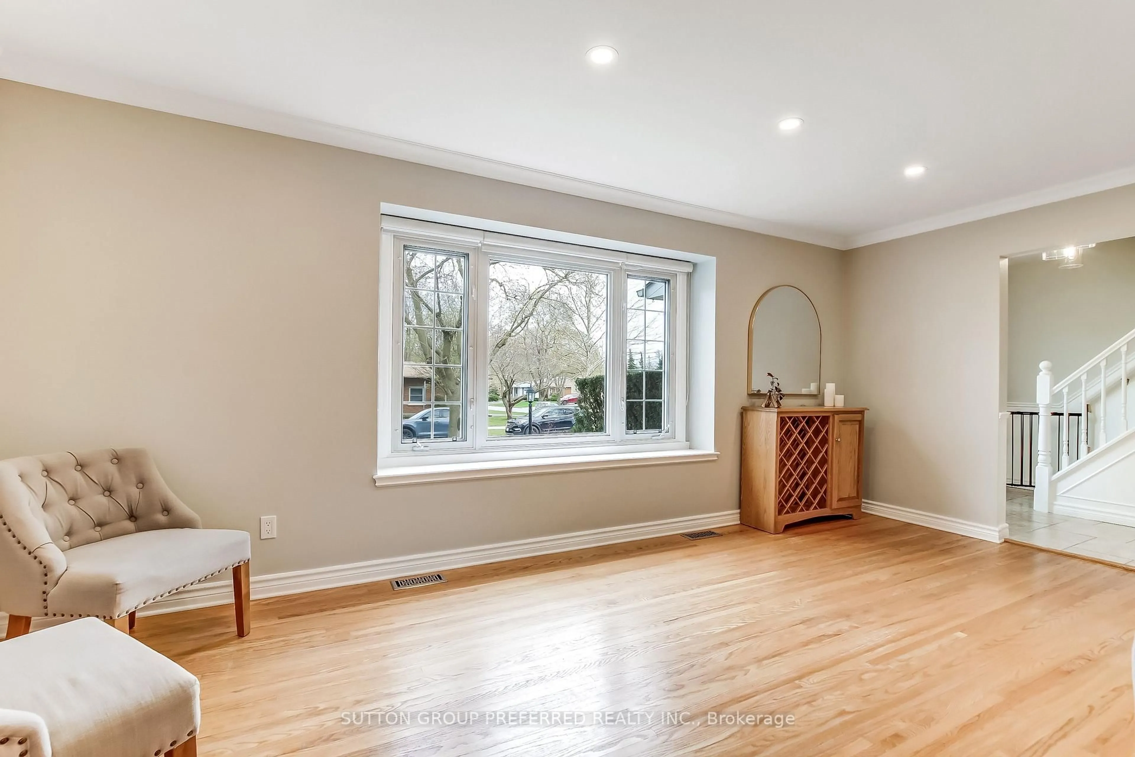 Living room with furniture, wood/laminate floor for 75 Chapple Hill Rd, Thames Centre Ontario N6G 2H2