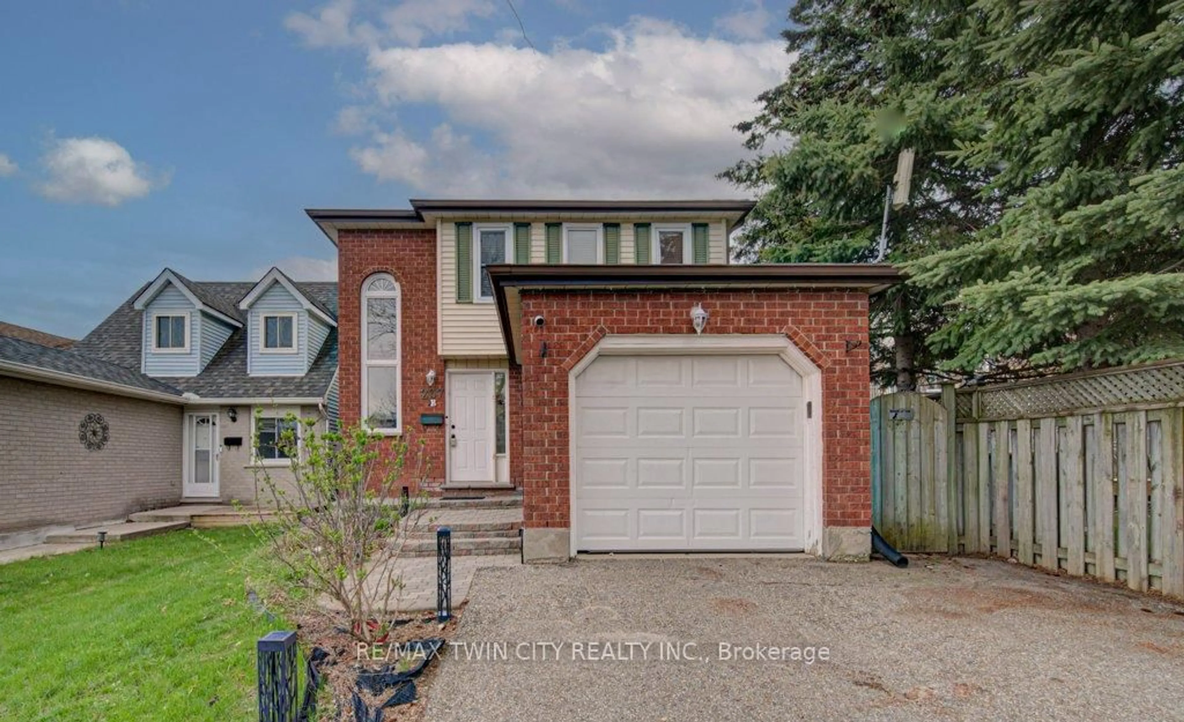Home with brick exterior material, street for 237B Thistleglen Pl, Waterloo Ontario N2T 2A6
