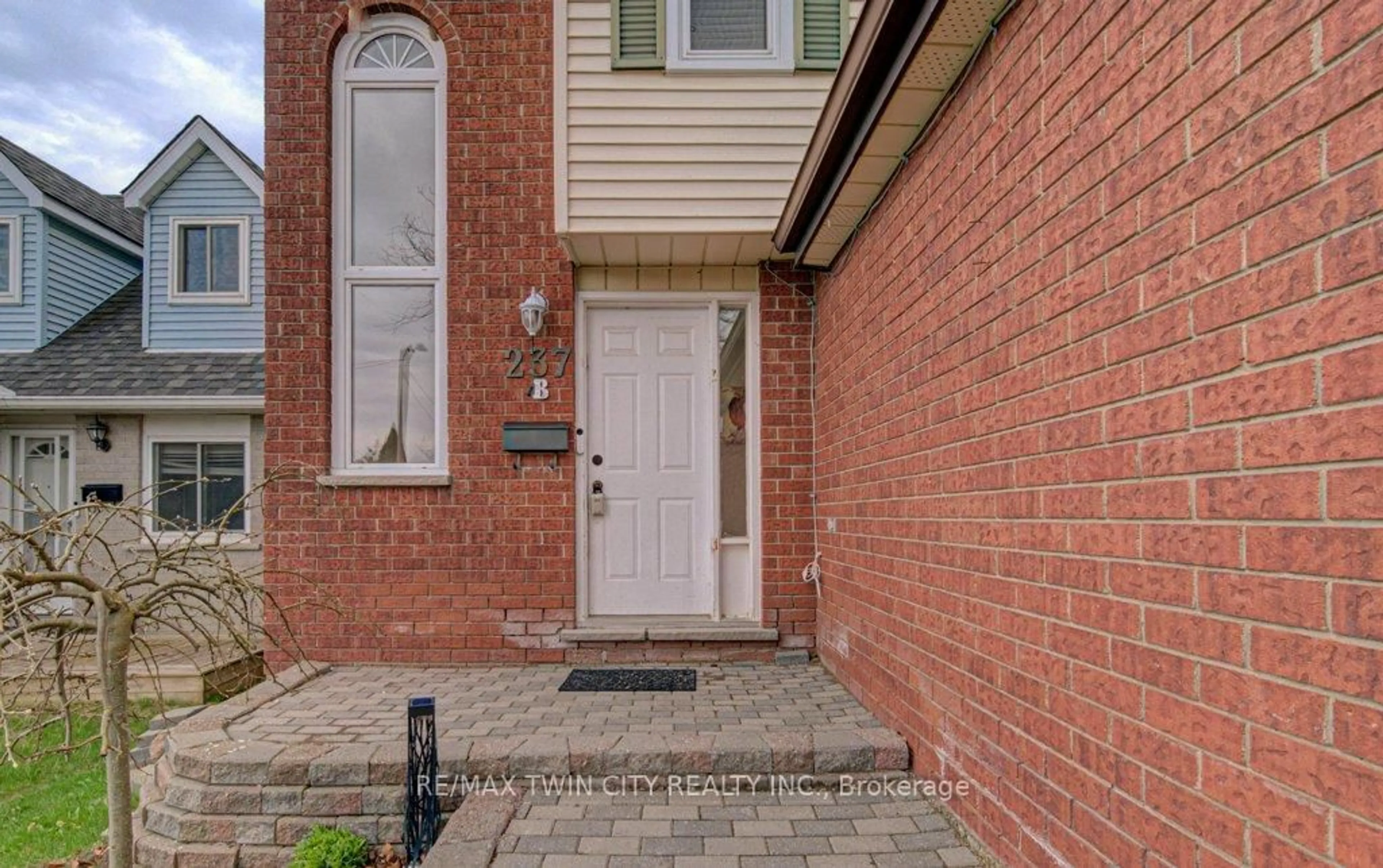 Home with brick exterior material, street for 237B Thistleglen Pl, Waterloo Ontario N2T 2A6