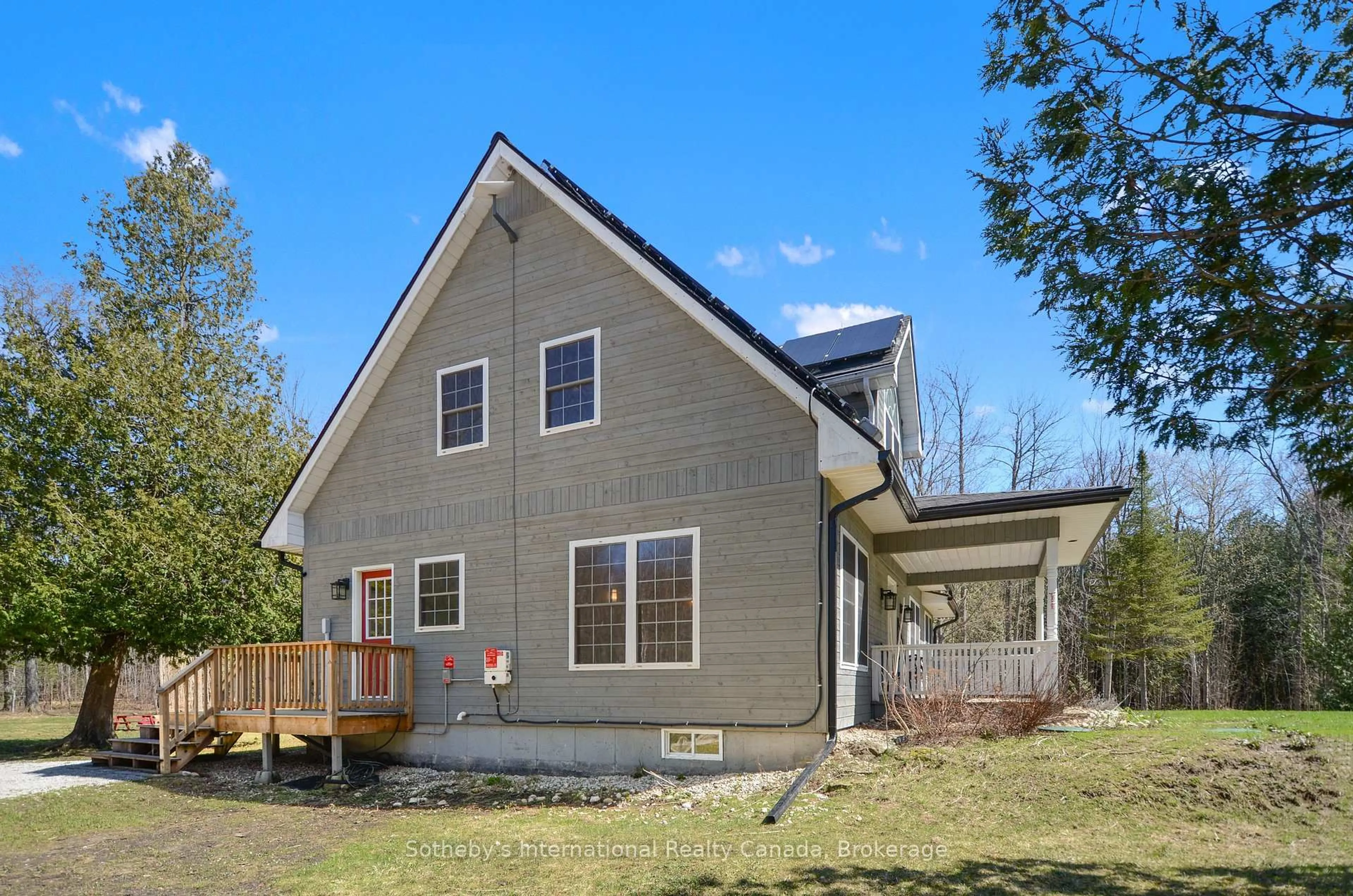 Home with vinyl exterior material, street for 403419 Concession 20 Rd, Georgian Bluffs Ontario N0H 1S0