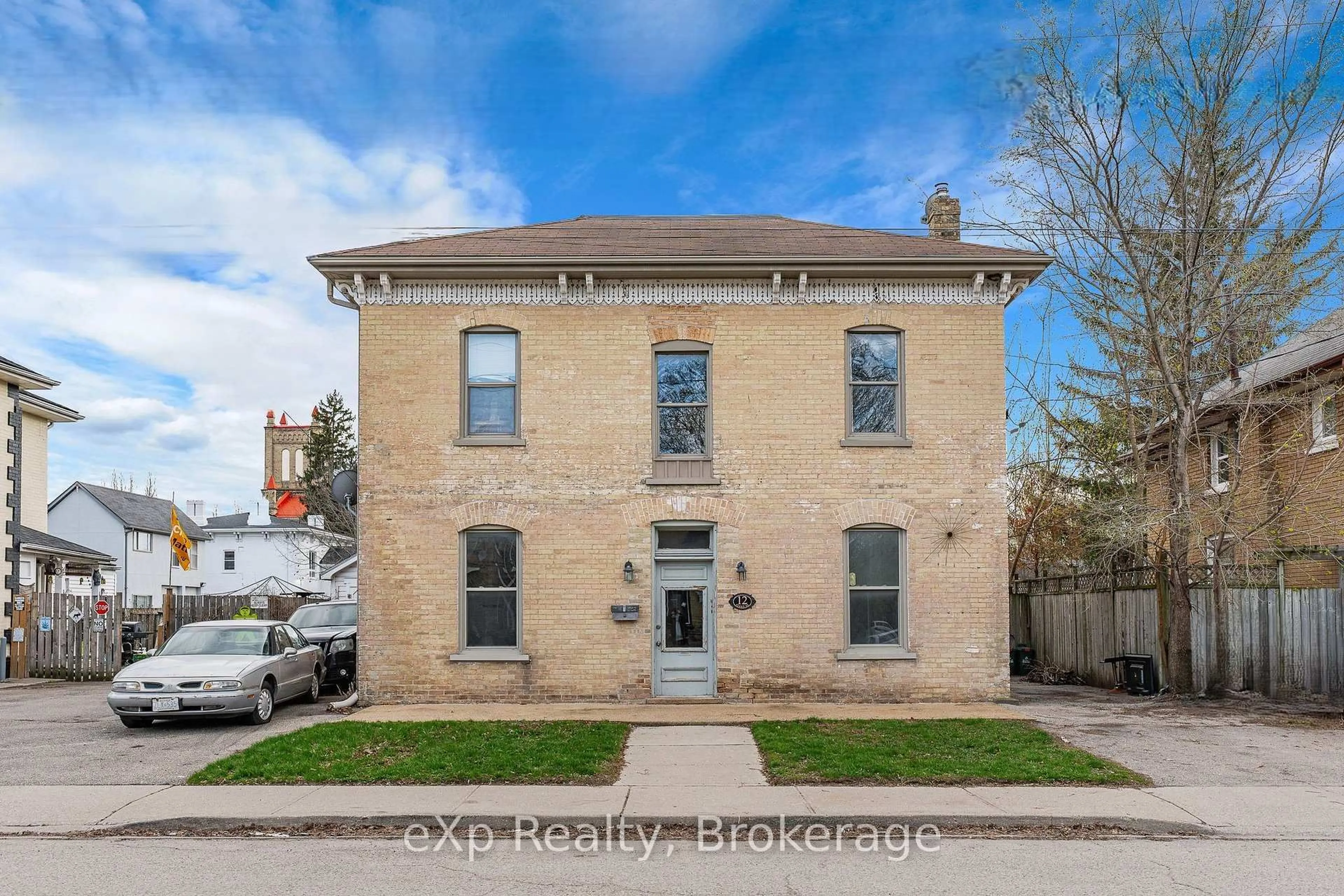 Home with brick exterior material, street for 12 Fleet St, Brantford Ontario N3T 3S7