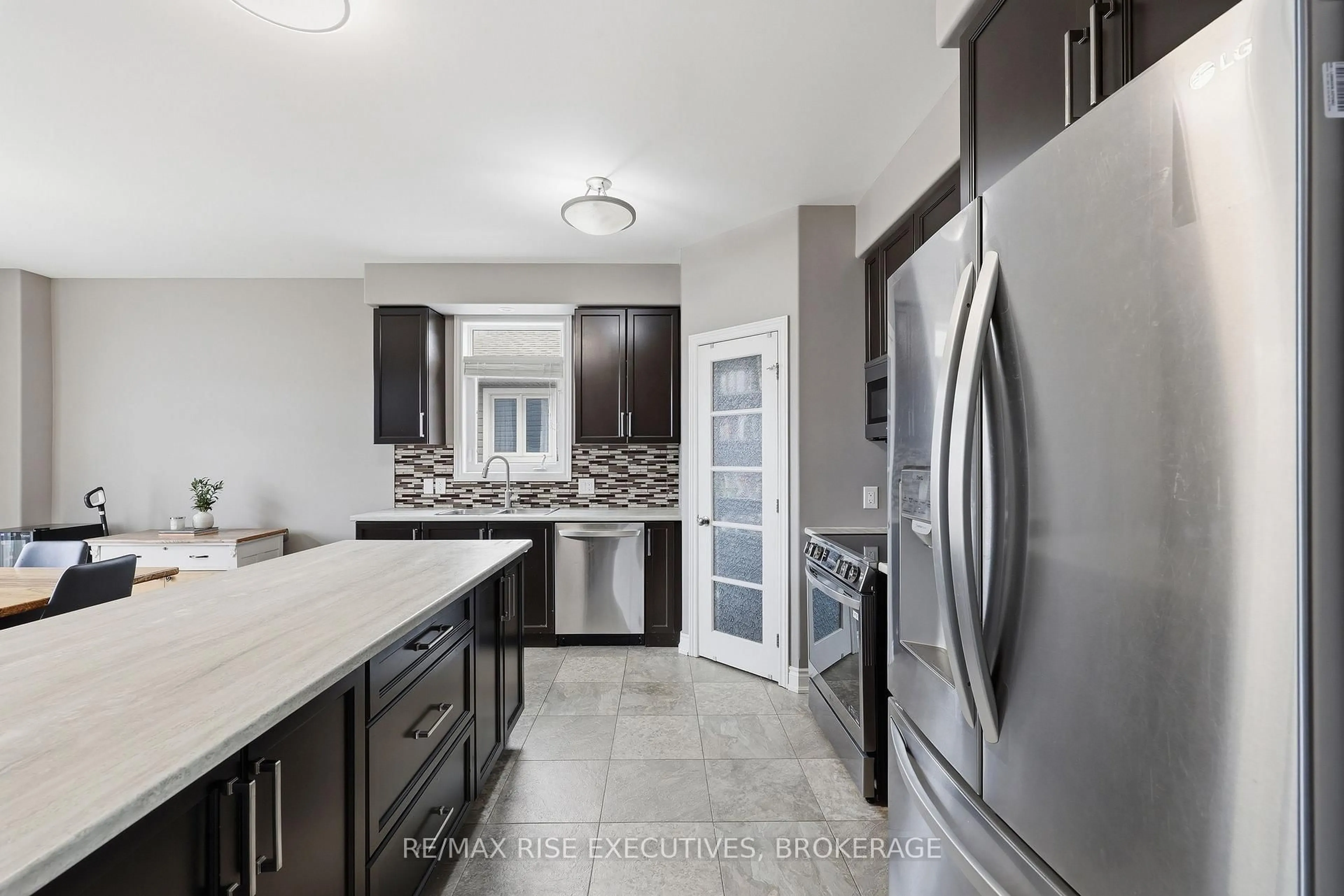 Contemporary kitchen, ceramic/tile floor for 203 Kildare Ave, Loyalist Ontario K7N 0A4
