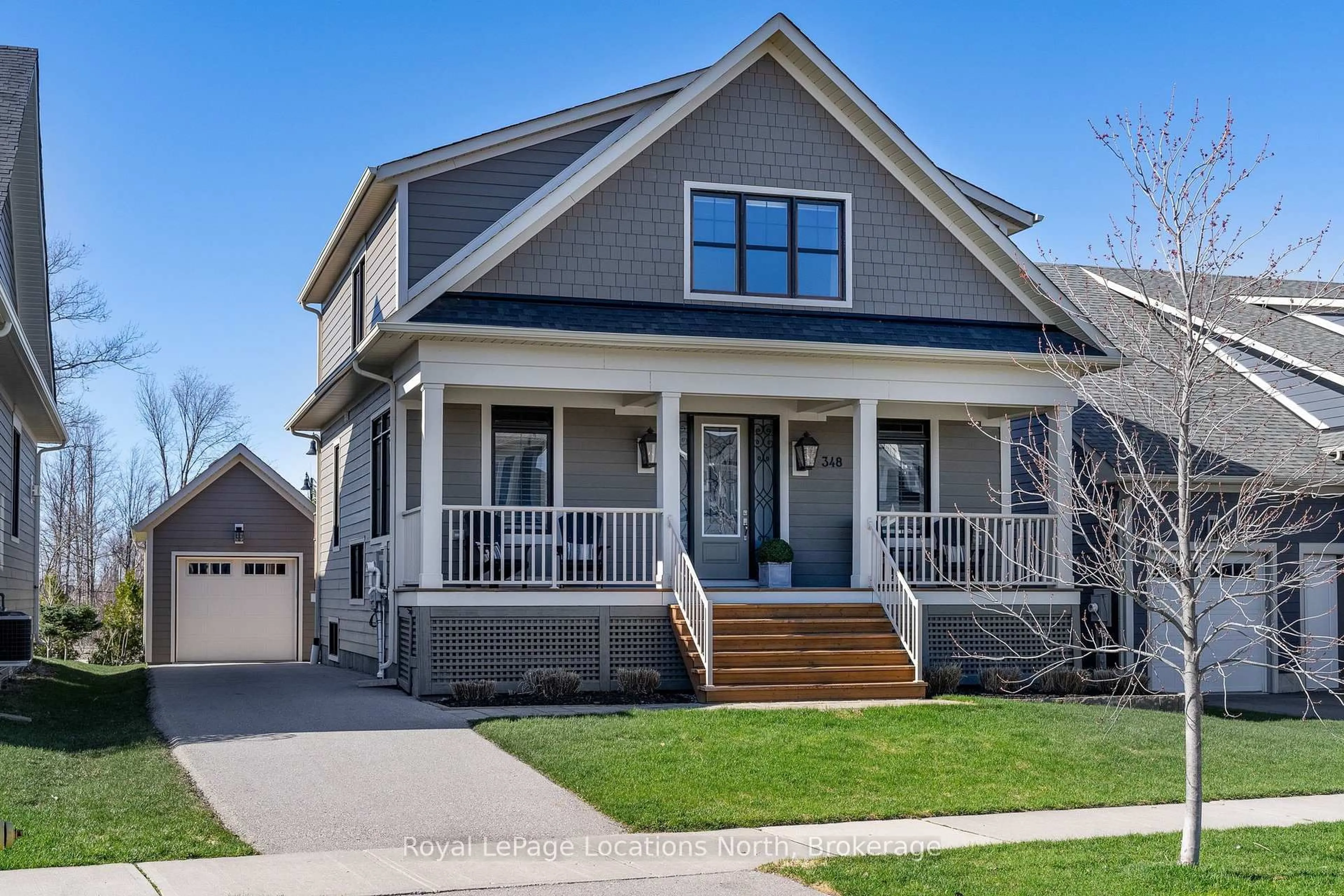 Home with vinyl exterior material, street for 348 Yellow Birch Cres, Blue Mountains Ontario L9Y 0Y5