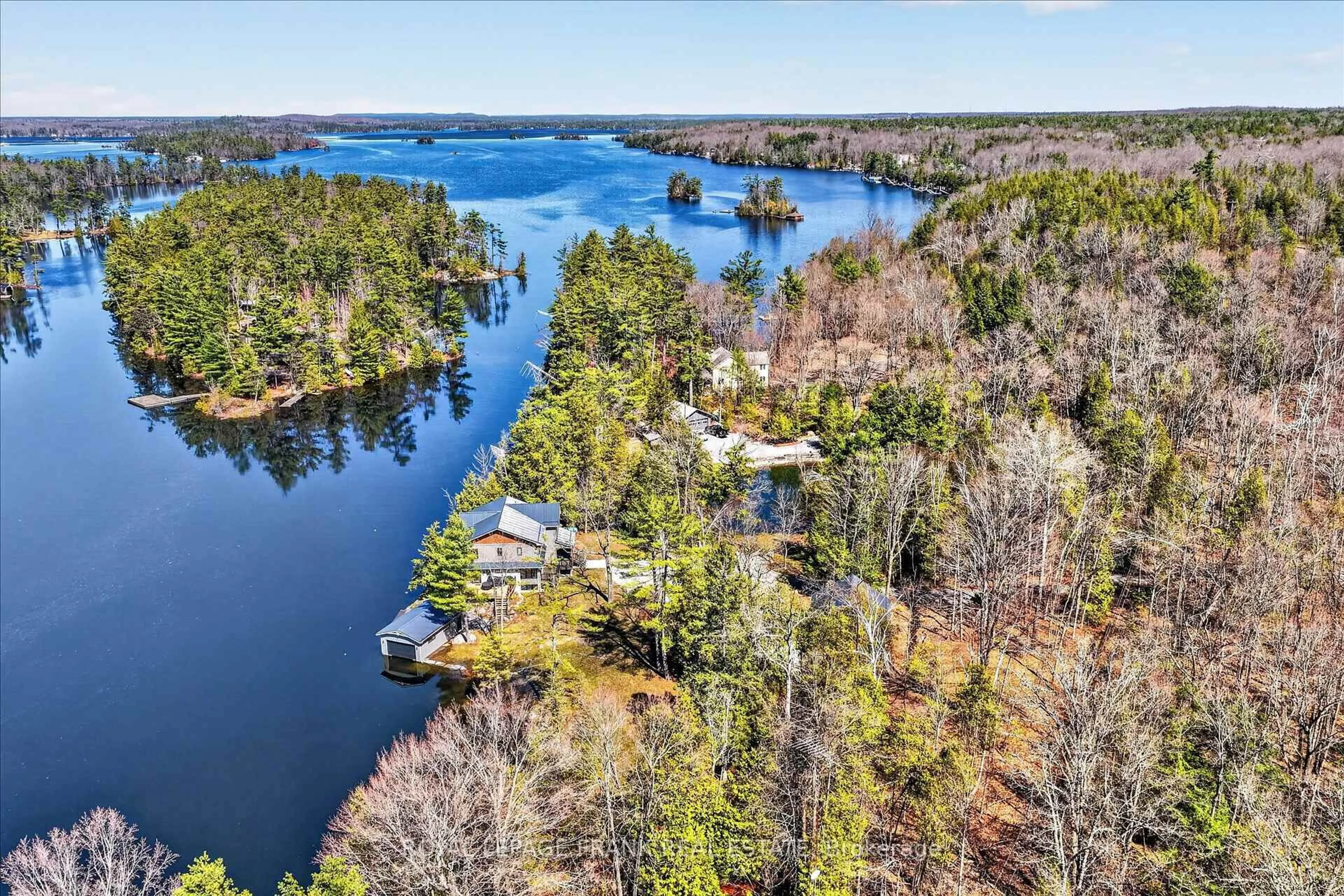 A pic from outside/outdoor area/front of a property/back of a property/a pic from drone, water/lake/river/ocean view for 1484 Birchview Rd, Douro-Dummer Ontario K0L 2H0