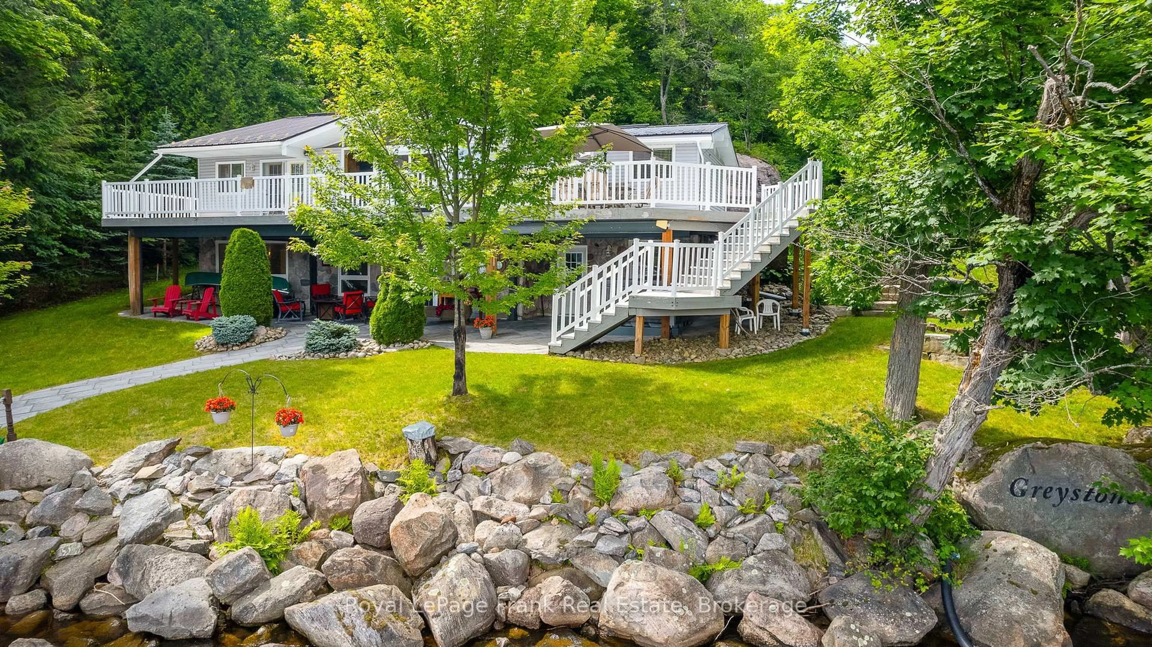 A pic from outside/outdoor area/front of a property/back of a property/a pic from drone, water/lake/river/ocean view for 1019 Carnation Lane, Dysart et al Ontario K0M 1S0