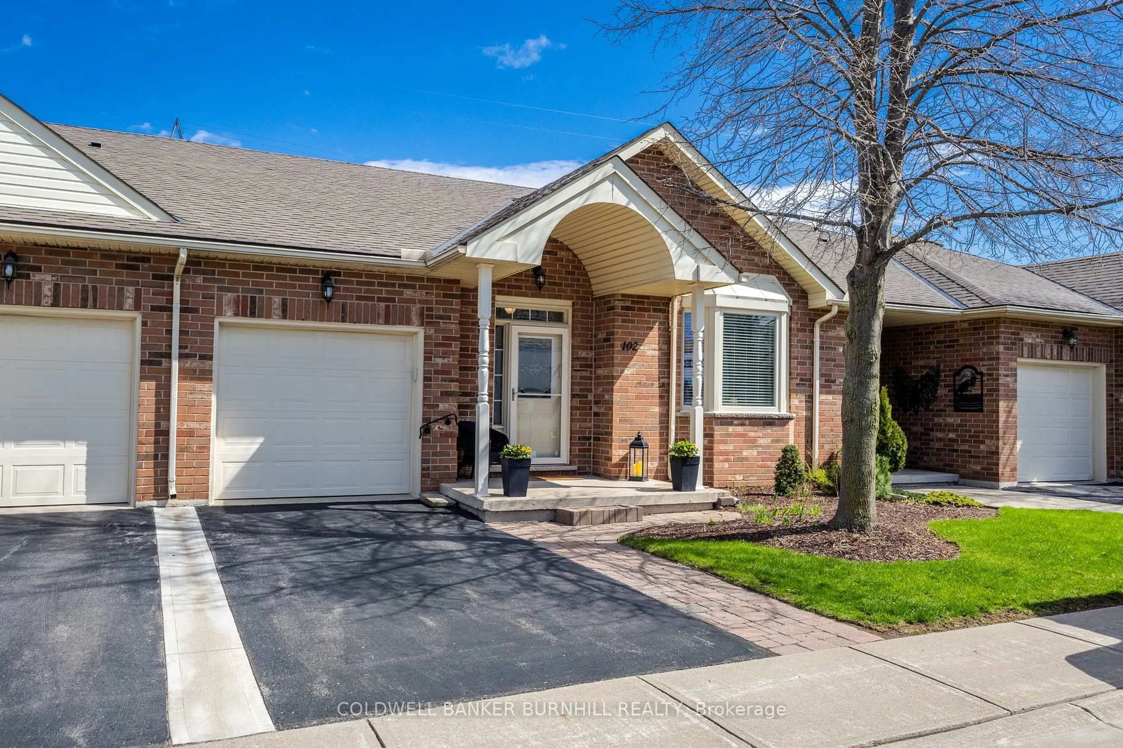 Home with brick exterior material, street for 102 Northernbreeze St, Hamilton Ontario L0R 1W0