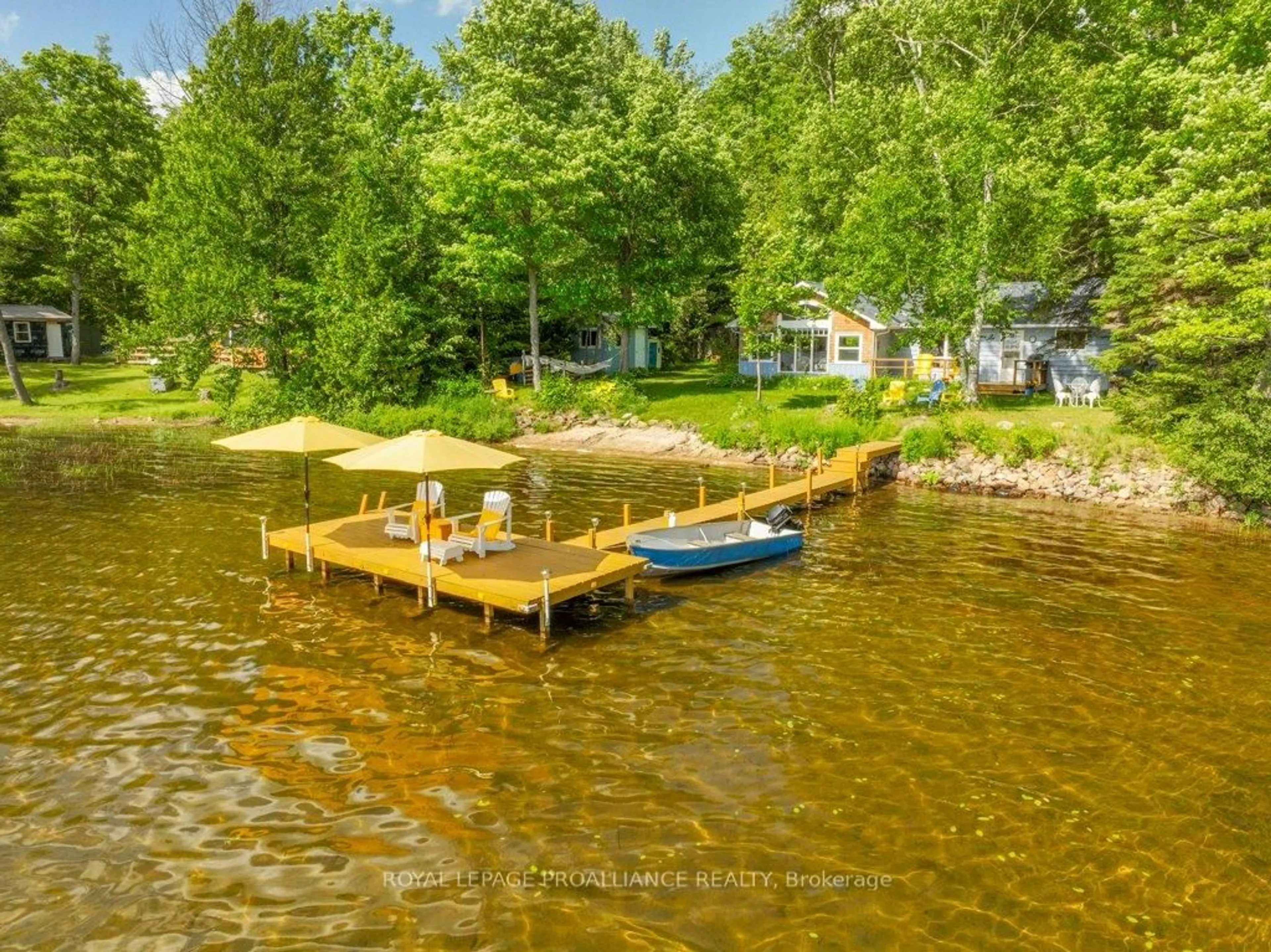 A pic from outside/outdoor area/front of a property/back of a property/a pic from drone, water/lake/river/ocean view for 1937A East Bay Rd, Plevna Ontario K0H 2M0