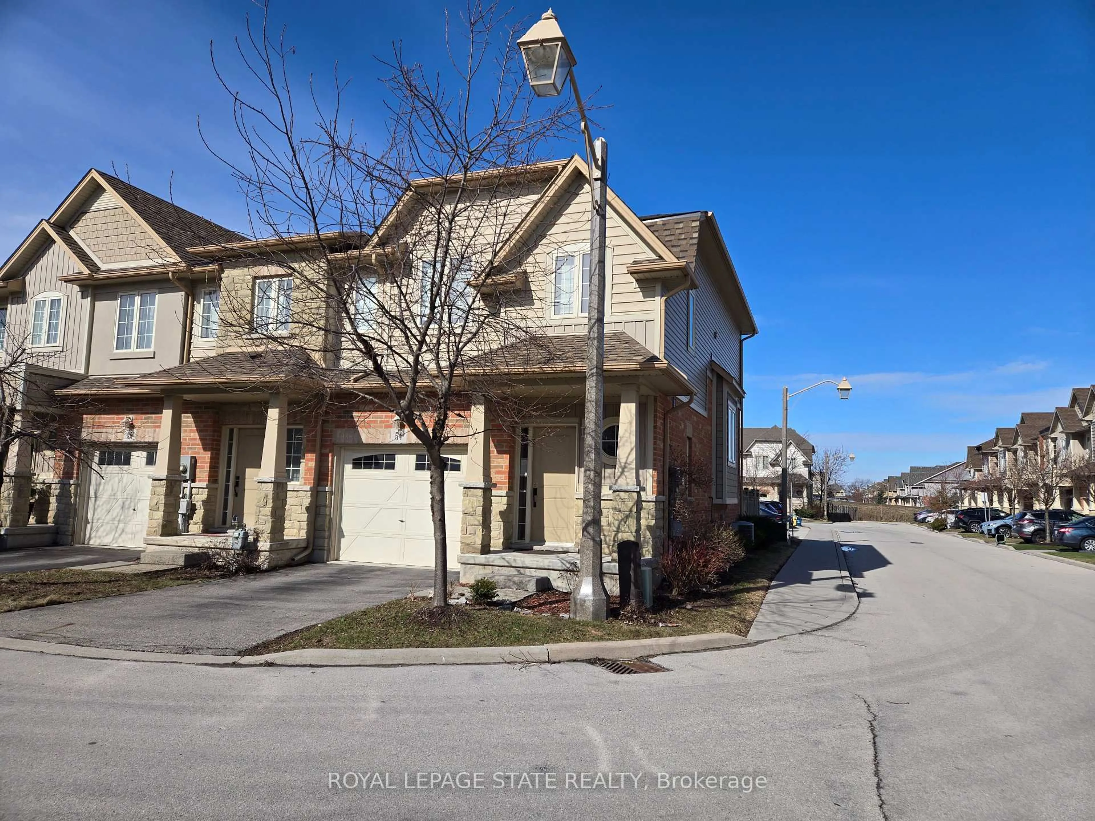 A pic from outside/outdoor area/front of a property/back of a property/a pic from drone, street for 8 Lakelawn Rd #54, Grimsby Ontario L3M 0G1