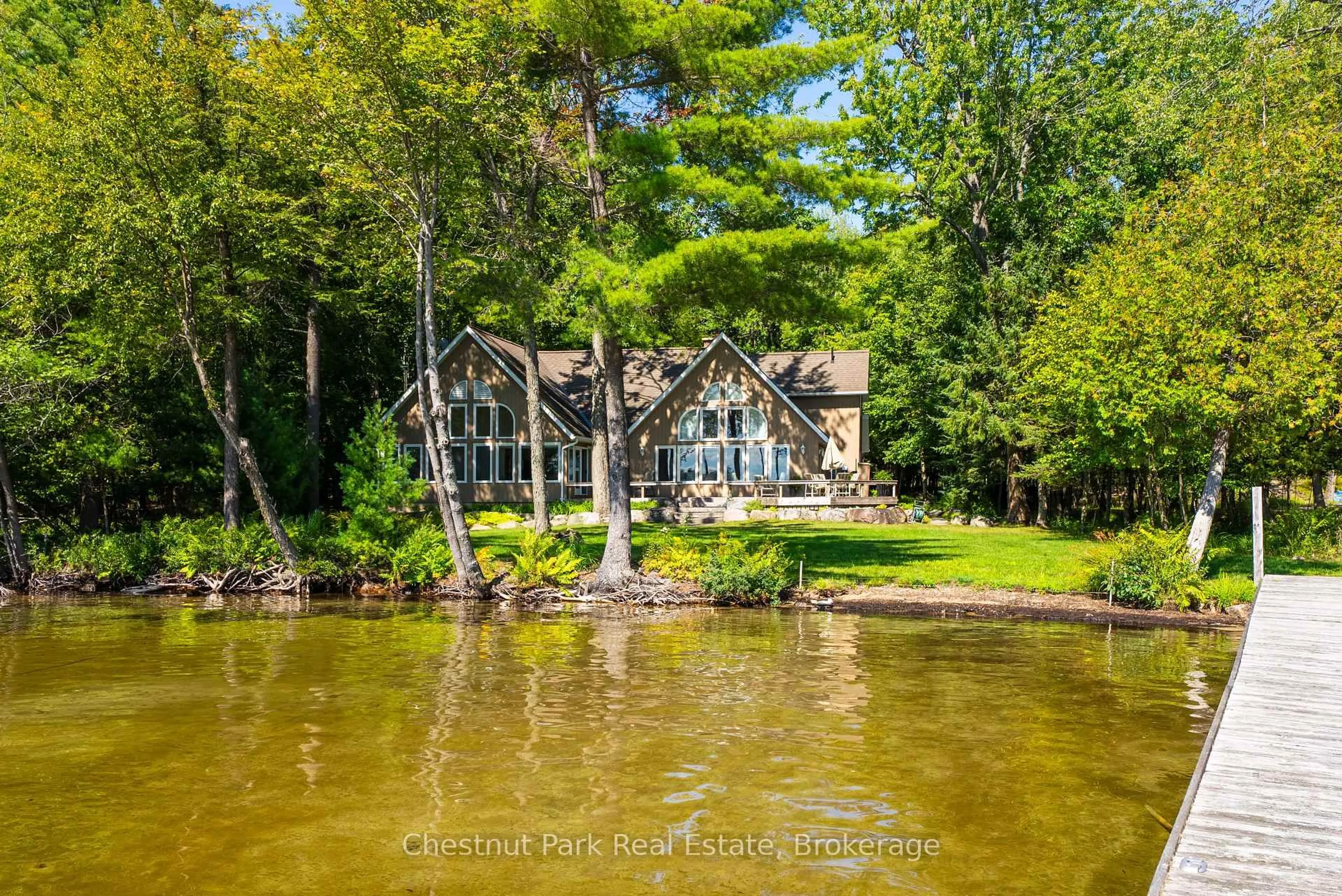 A pic from outside/outdoor area/front of a property/back of a property/a pic from drone, water/lake/river/ocean view for 1166-2 Morinus Rd, Muskoka Lakes Ontario P0B 1G0