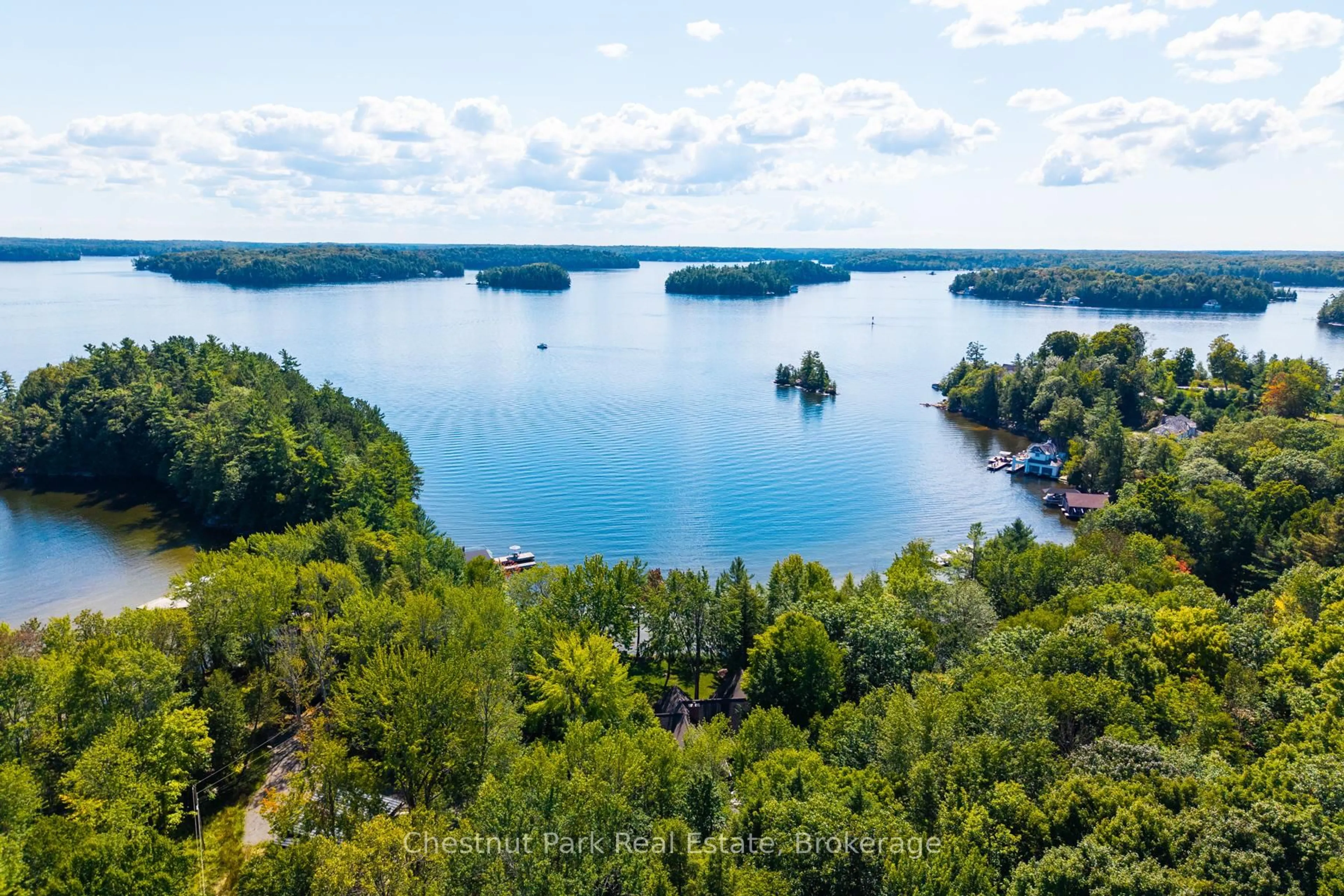 A pic from outside/outdoor area/front of a property/back of a property/a pic from drone, water/lake/river/ocean view for 1166-2 Morinus Rd, Muskoka Lakes Ontario P0B 1G0