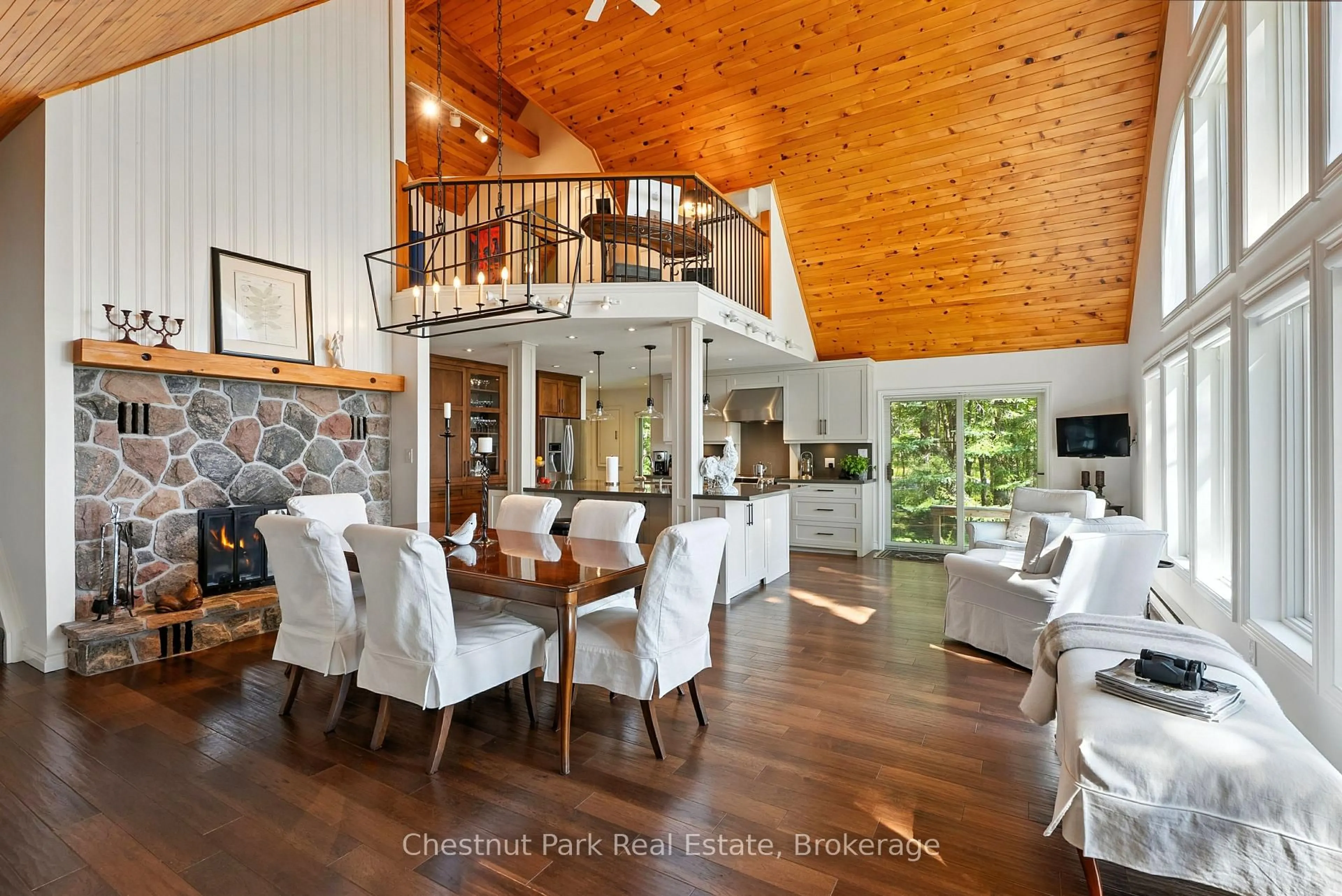 Open concept kitchen, wood/laminate floor for 1166-2 Morinus Rd, Muskoka Lakes Ontario P0B 1G0