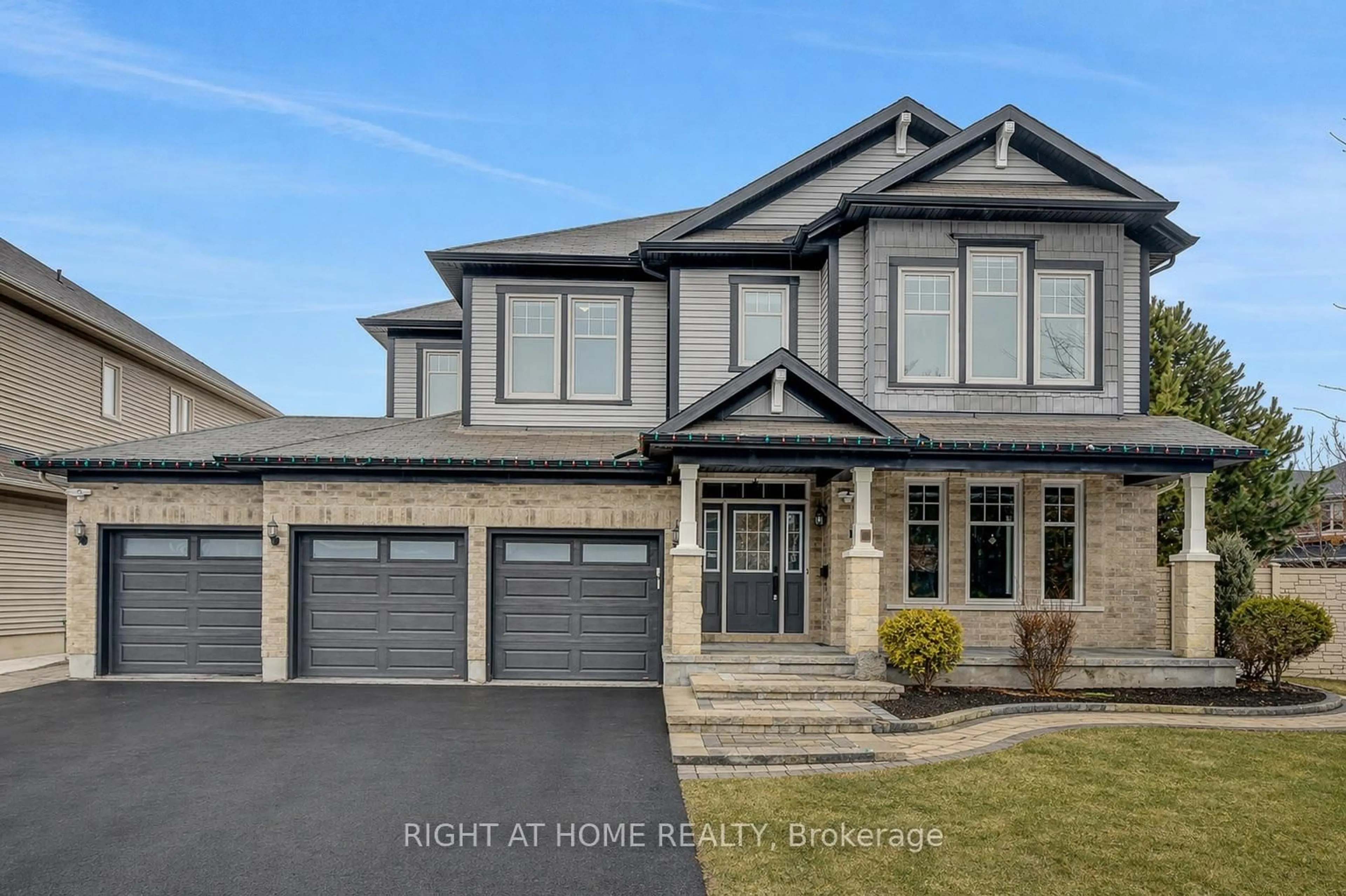 Home with vinyl exterior material, street for 701 Everlasting Cres, Ottawa Ontario K4A 0K2