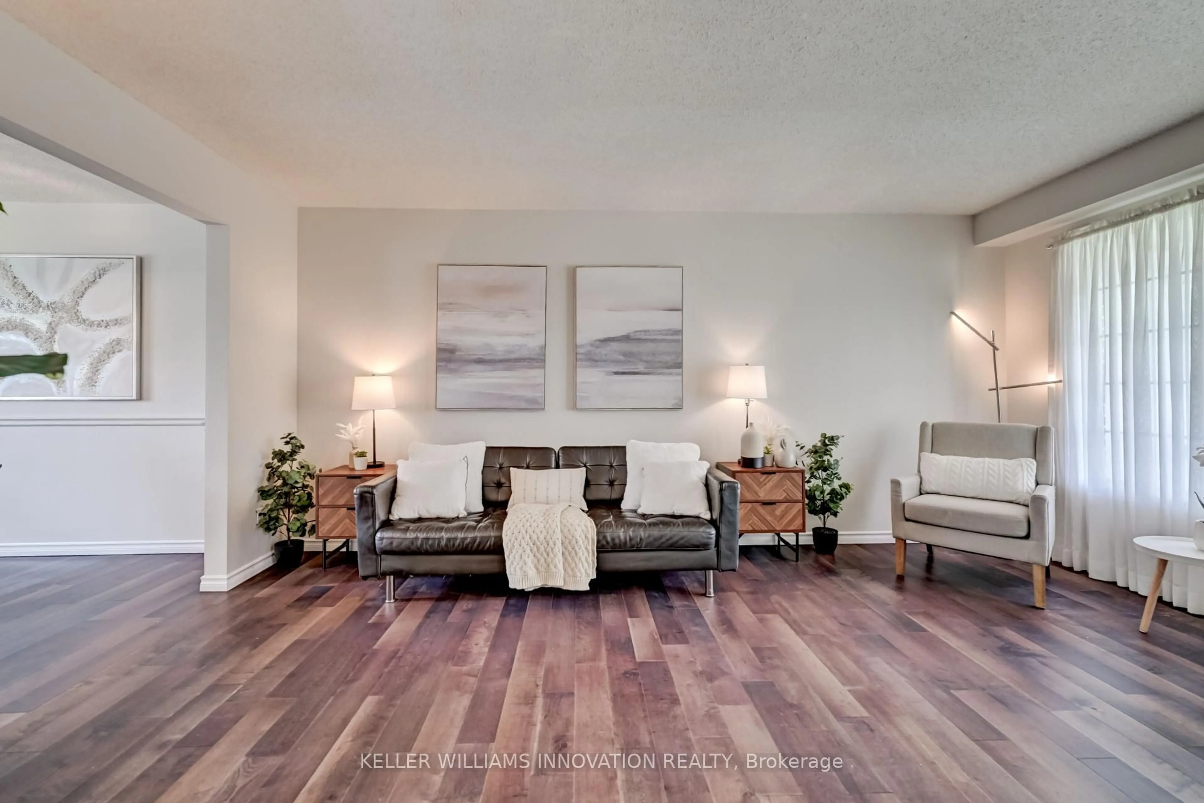 Living room with furniture, wood/laminate floor for 33 Carlyle Pl, Kitchener Ontario N2P 1R6