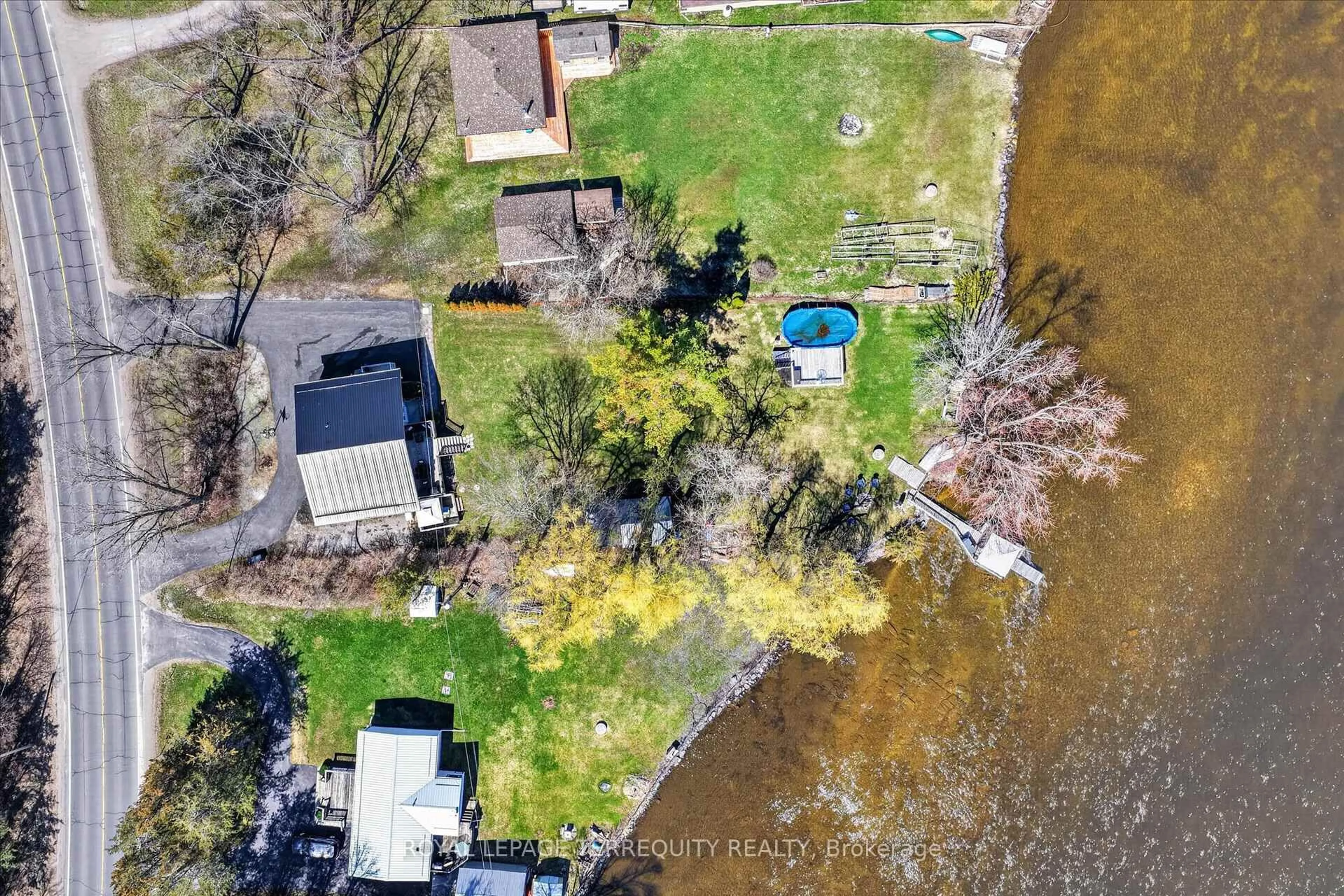 A pic from outside/outdoor area/front of a property/back of a property/a pic from drone, water/lake/river/ocean view for 6787 County Road 50, Trent Hills Ontario K0L 1L0