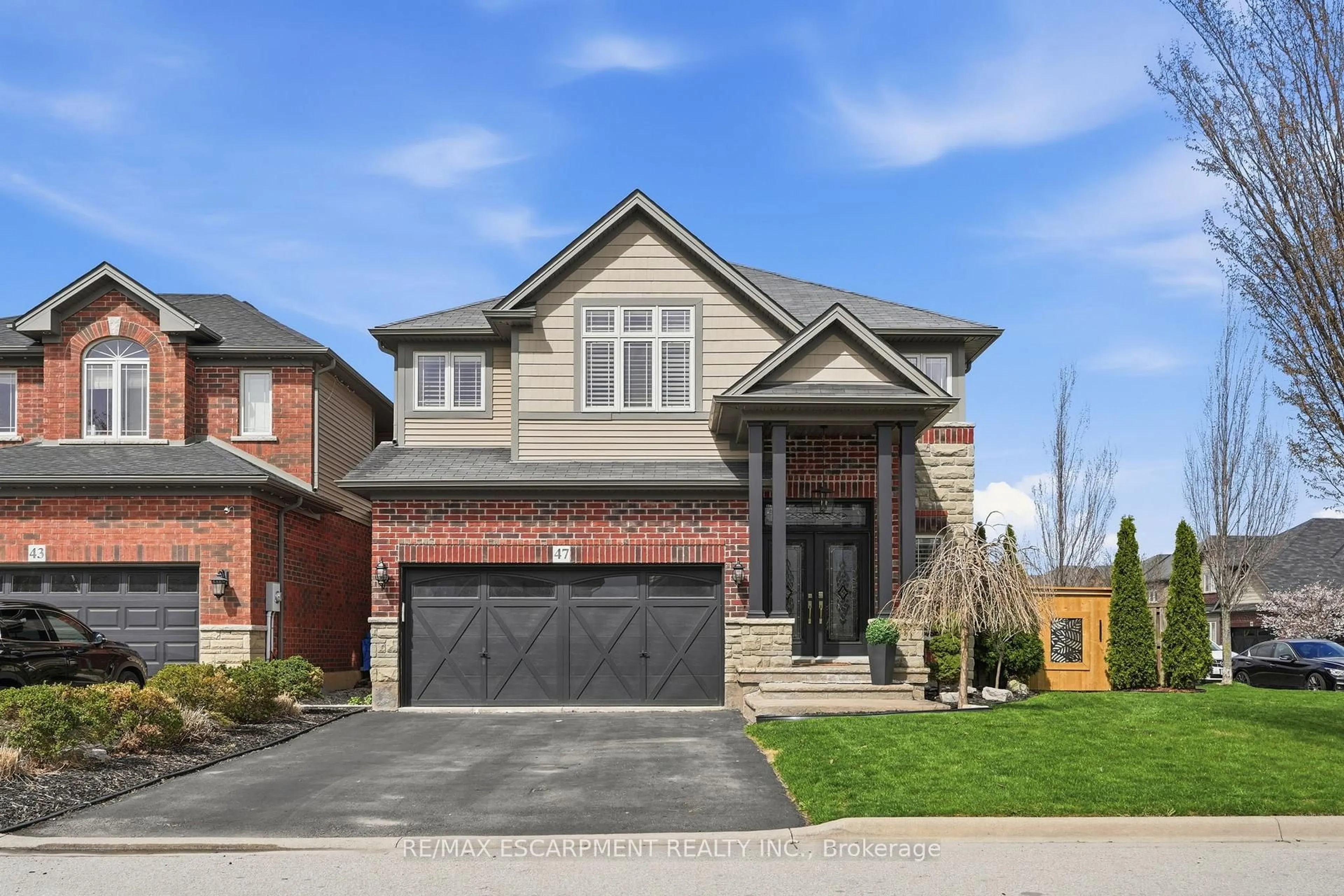Home with brick exterior material, street for 47 Winners Way, Hamilton Ontario L0R 1C0