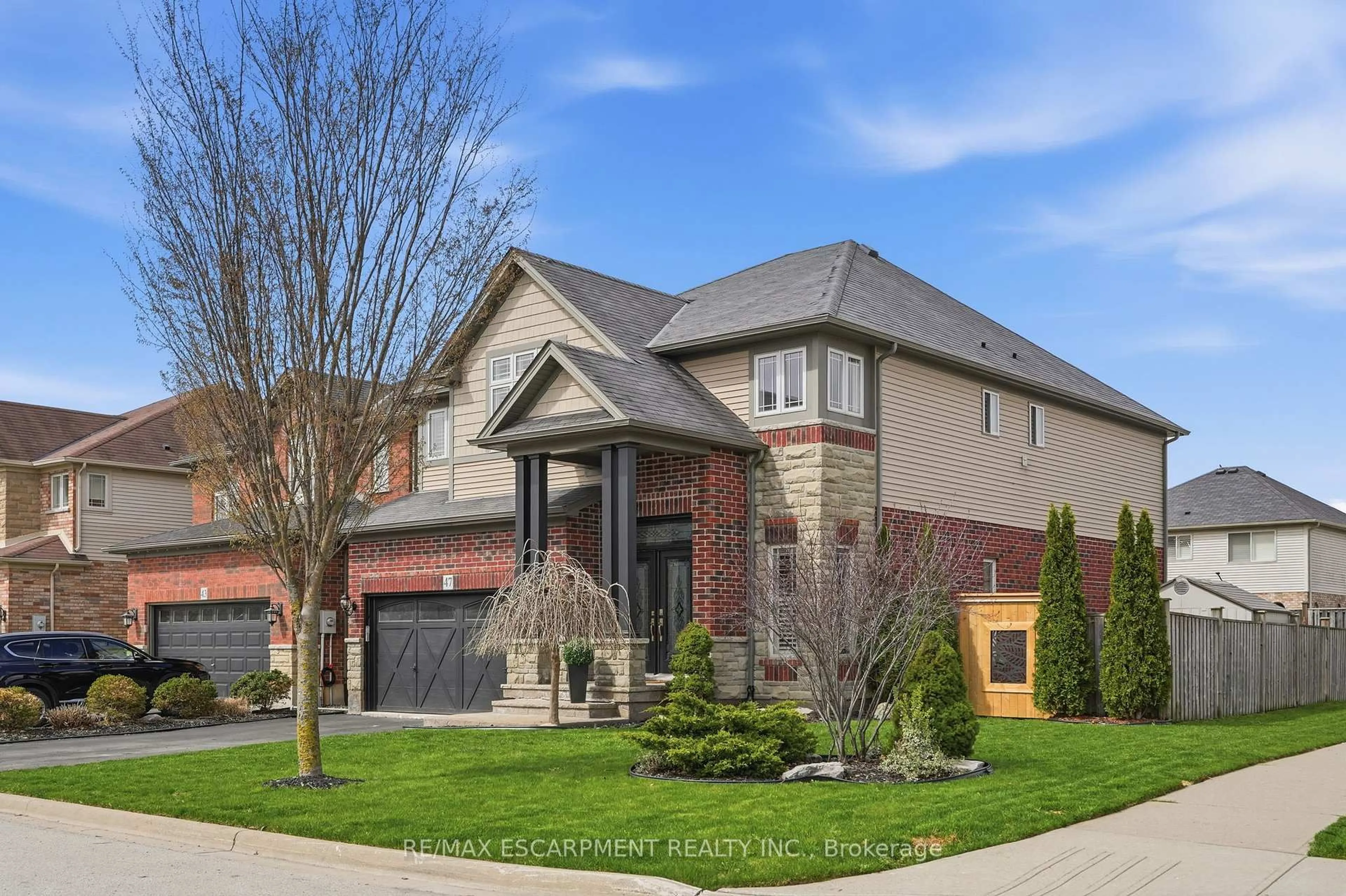 Home with brick exterior material, street for 47 Winners Way, Hamilton Ontario L0R 1C0