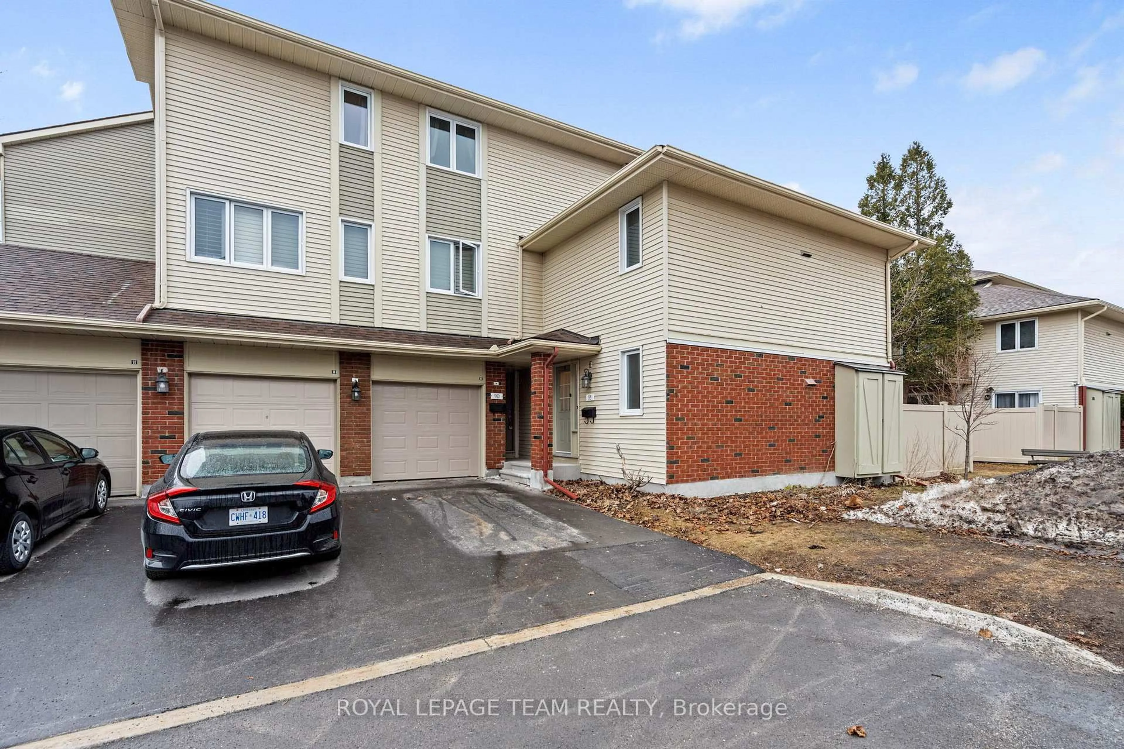 A pic from outside/outdoor area/front of a property/back of a property/a pic from drone, street for 90 Haxby Private, Ottawa Ontario K1T 3C4