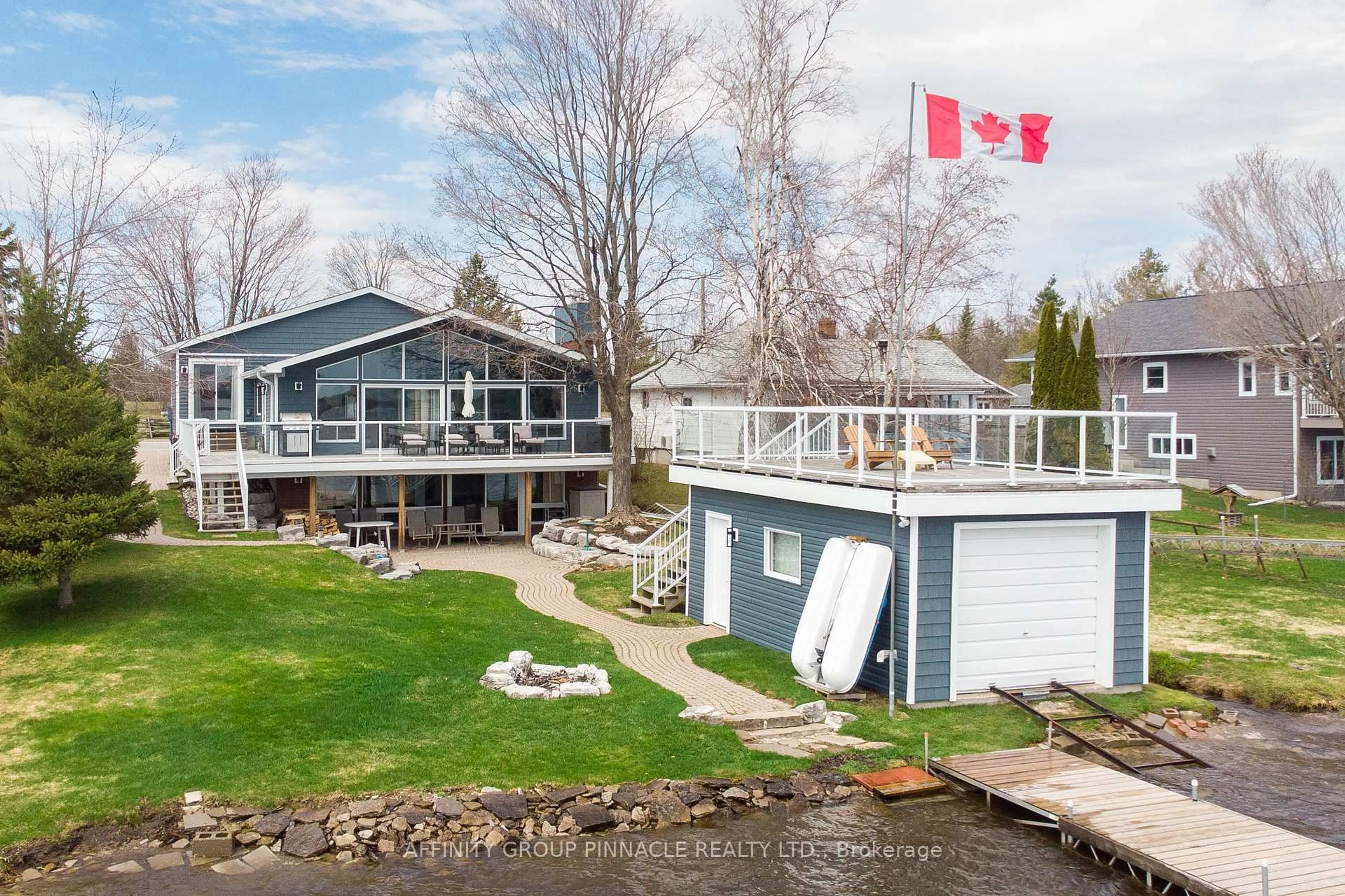 A pic from outside/outdoor area/front of a property/back of a property/a pic from drone, water/lake/river/ocean view for 73 Admiral Dr, Kawartha Lakes Ontario K0M 1G0