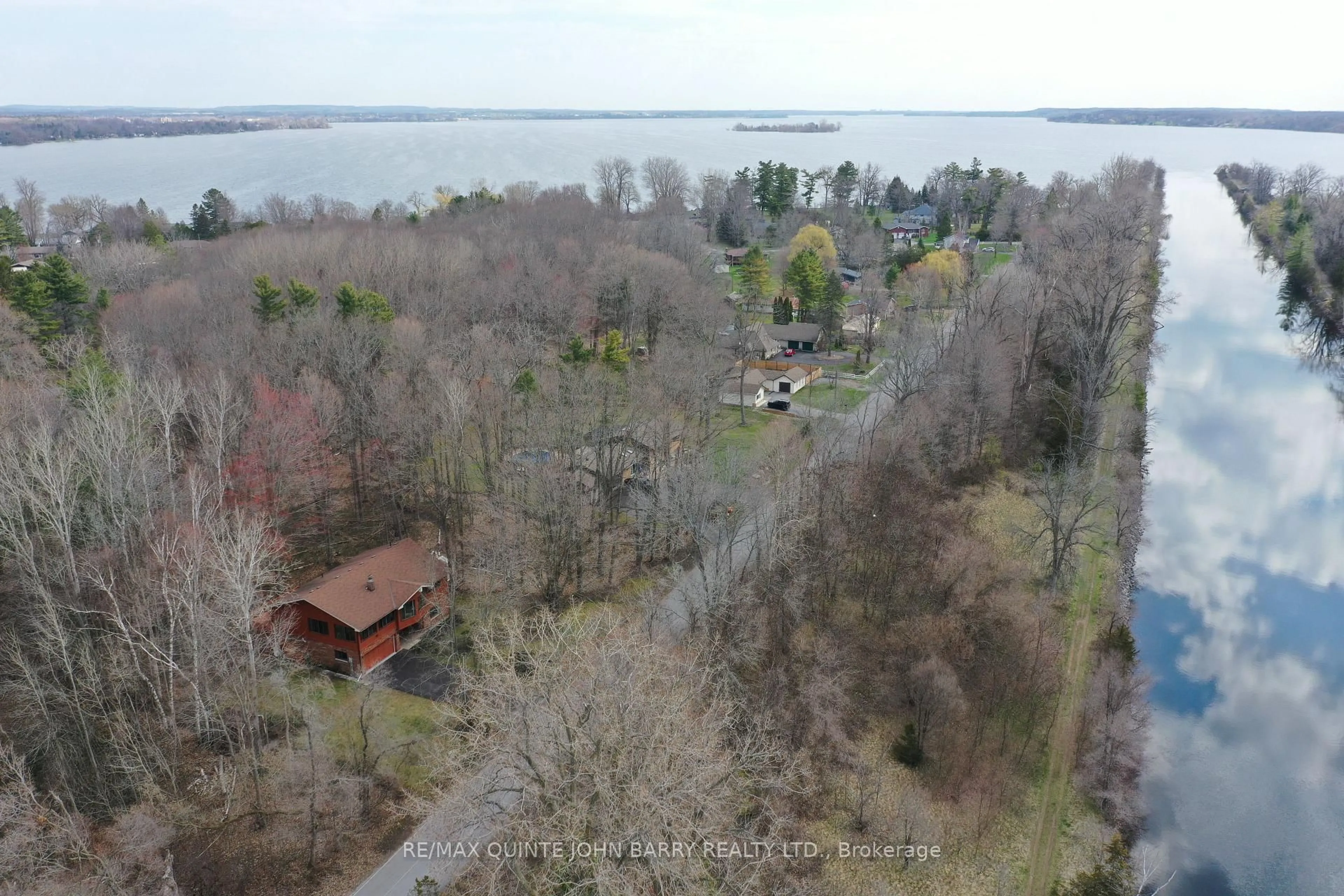 A pic from outside/outdoor area/front of a property/back of a property/a pic from drone, water/lake/river/ocean view for 46 Twelve O'Clock Pt Rd, Quinte West Ontario K0K 1L0