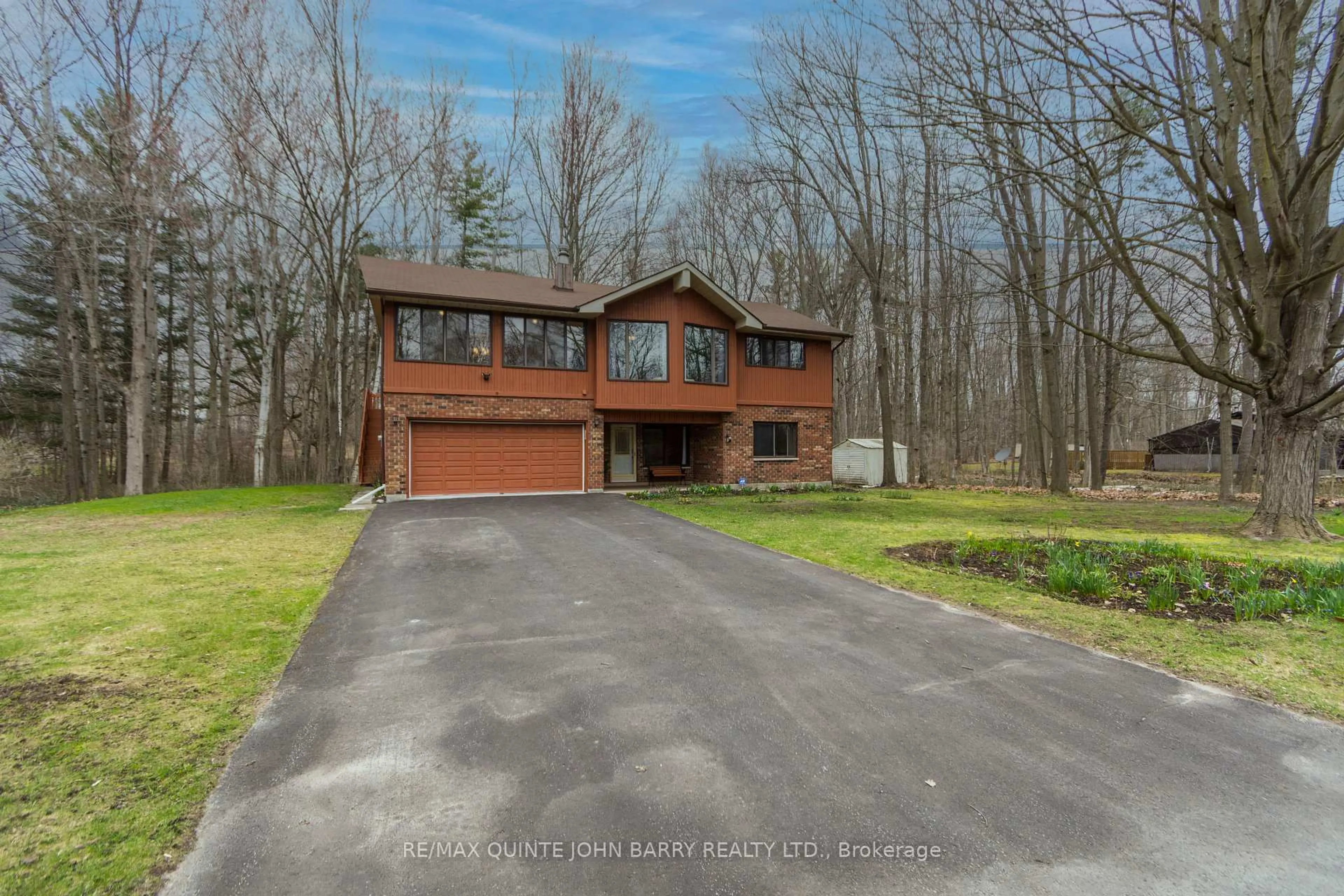 A pic from outside/outdoor area/front of a property/back of a property/a pic from drone, water/lake/river/ocean view for 46 Twelve O'Clock Pt Rd, Quinte West Ontario K0K 1L0