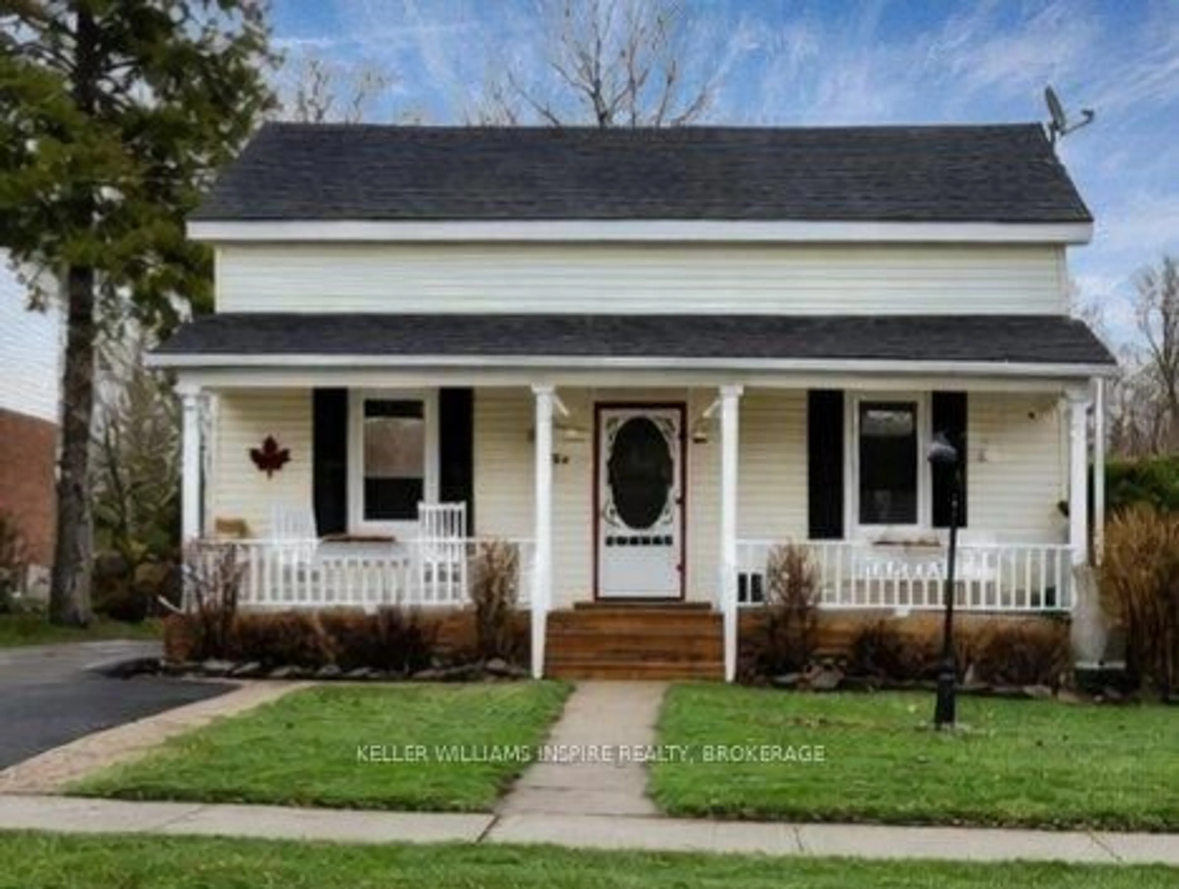 Home with vinyl exterior material, street for 39 Centre St, Brighton Ontario K0K 1H0