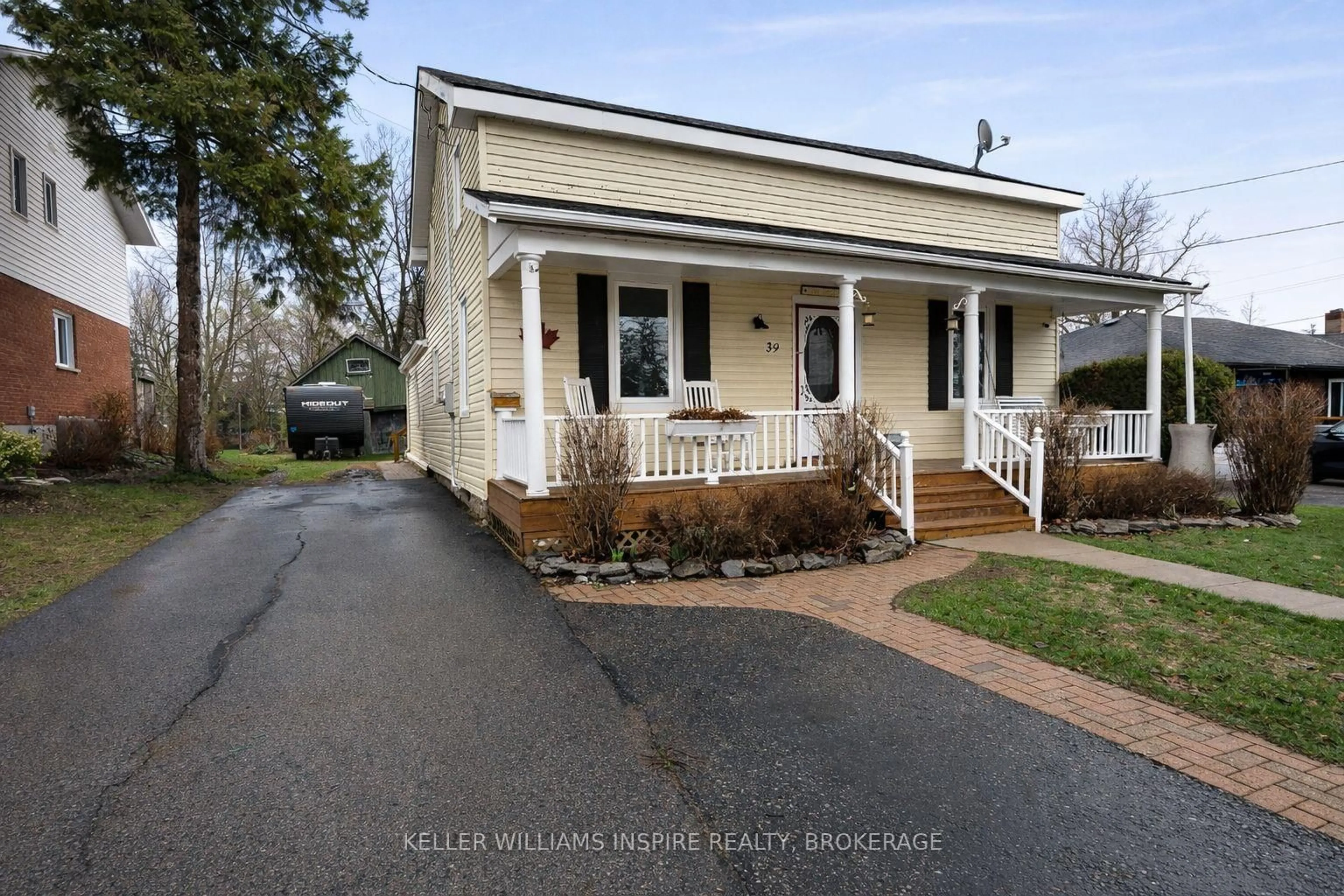 Home with vinyl exterior material, street for 39 Centre St, Brighton Ontario K0K 1H0