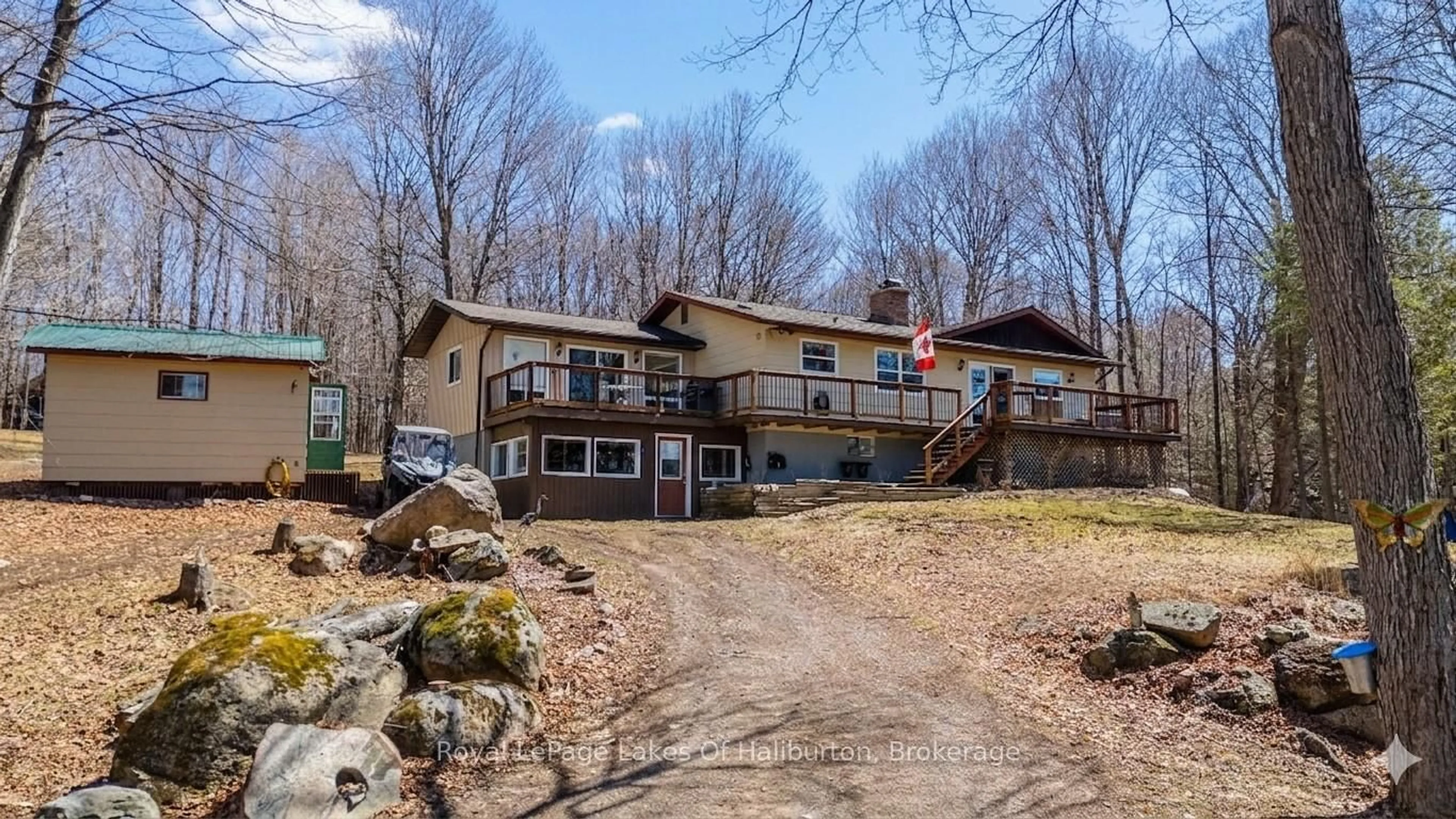 A pic from outside/outdoor area/front of a property/back of a property/a pic from drone, water/lake/river/ocean view for 1096 Chelsea Lane, Algonquin Highlands Ontario K0M 1S0