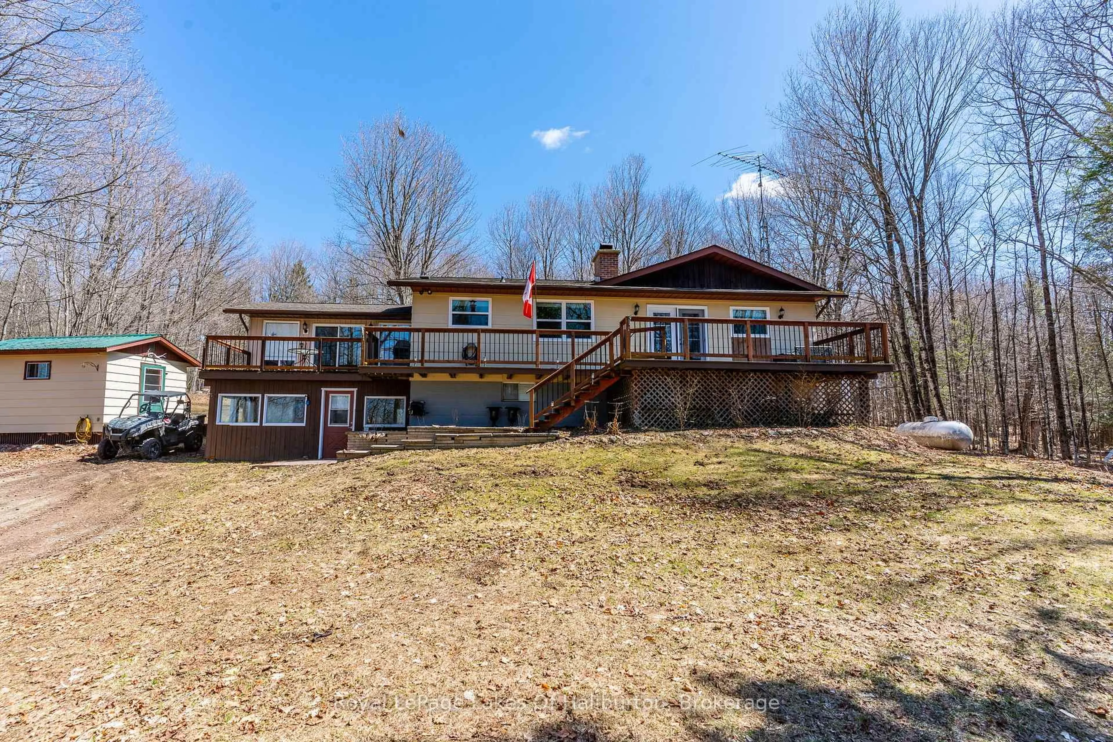 A pic from outside/outdoor area/front of a property/back of a property/a pic from drone, water/lake/river/ocean view for 1096 Chelsea Lane, Algonquin Highlands Ontario K0M 1S0