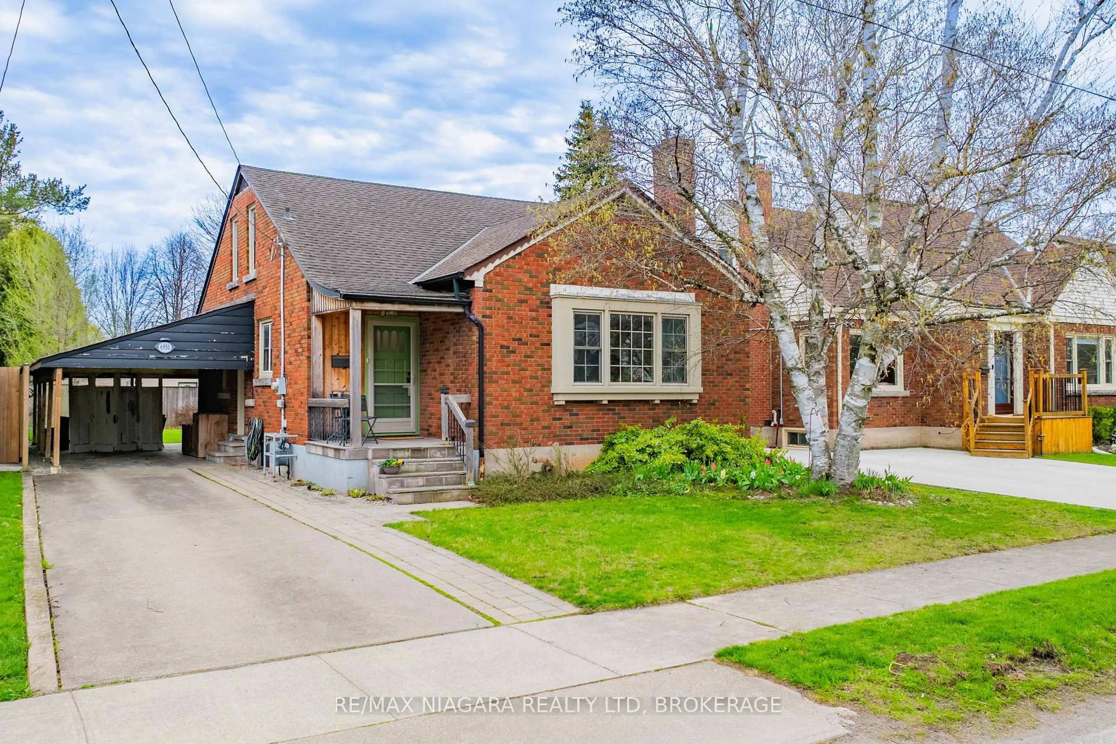 Home with brick exterior material, street for 6950 Leeming St, Niagara Falls Ontario L2G 1L1