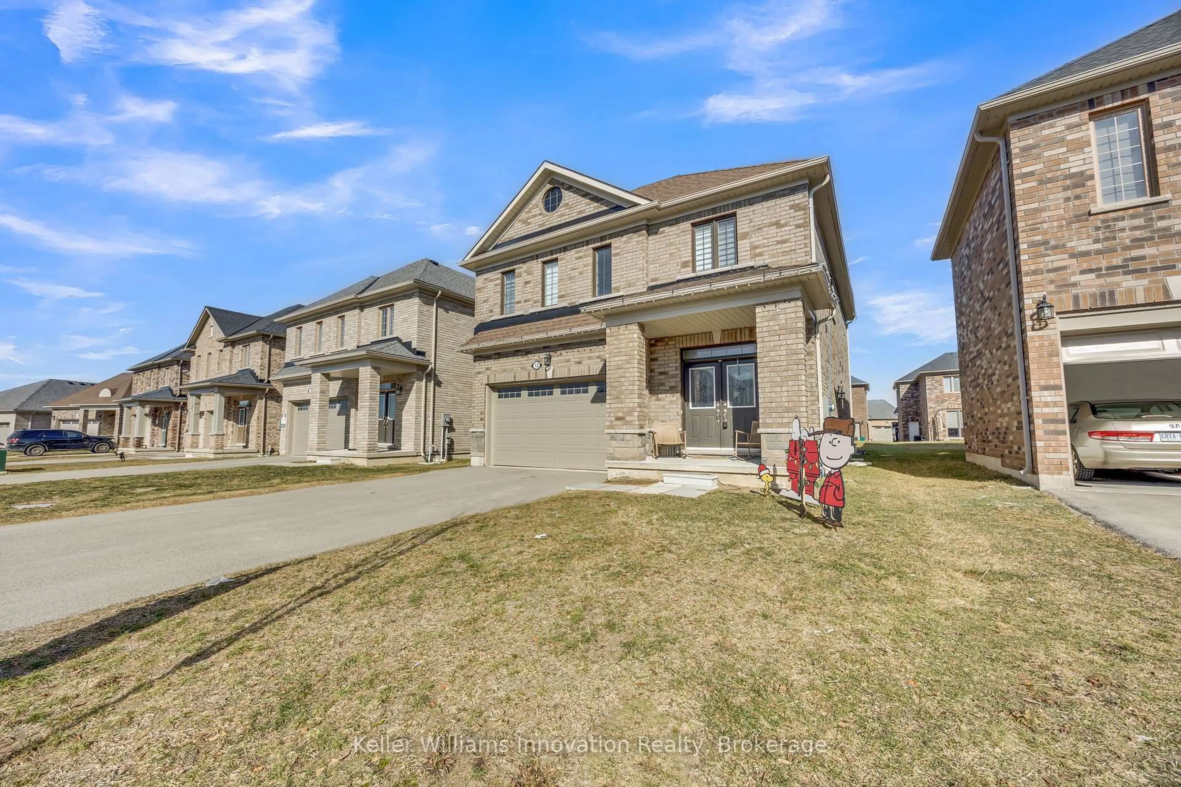 Home with brick exterior material, street for 12 Harwood St, Tillsonburg Ontario N4G 0J8