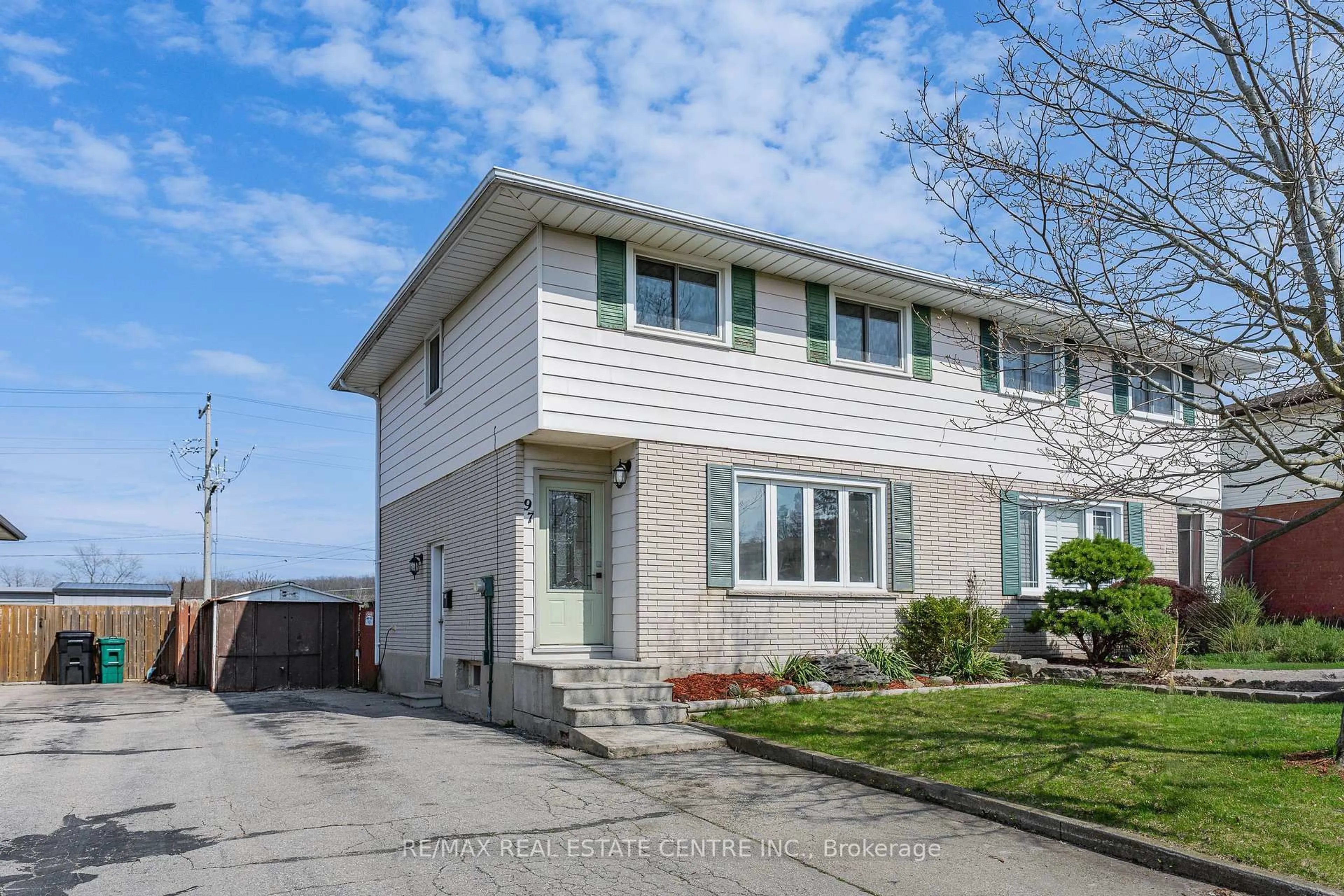 Home with vinyl exterior material, street for 97 Moffat Dr, Cambridge Ontario N1R 6C1