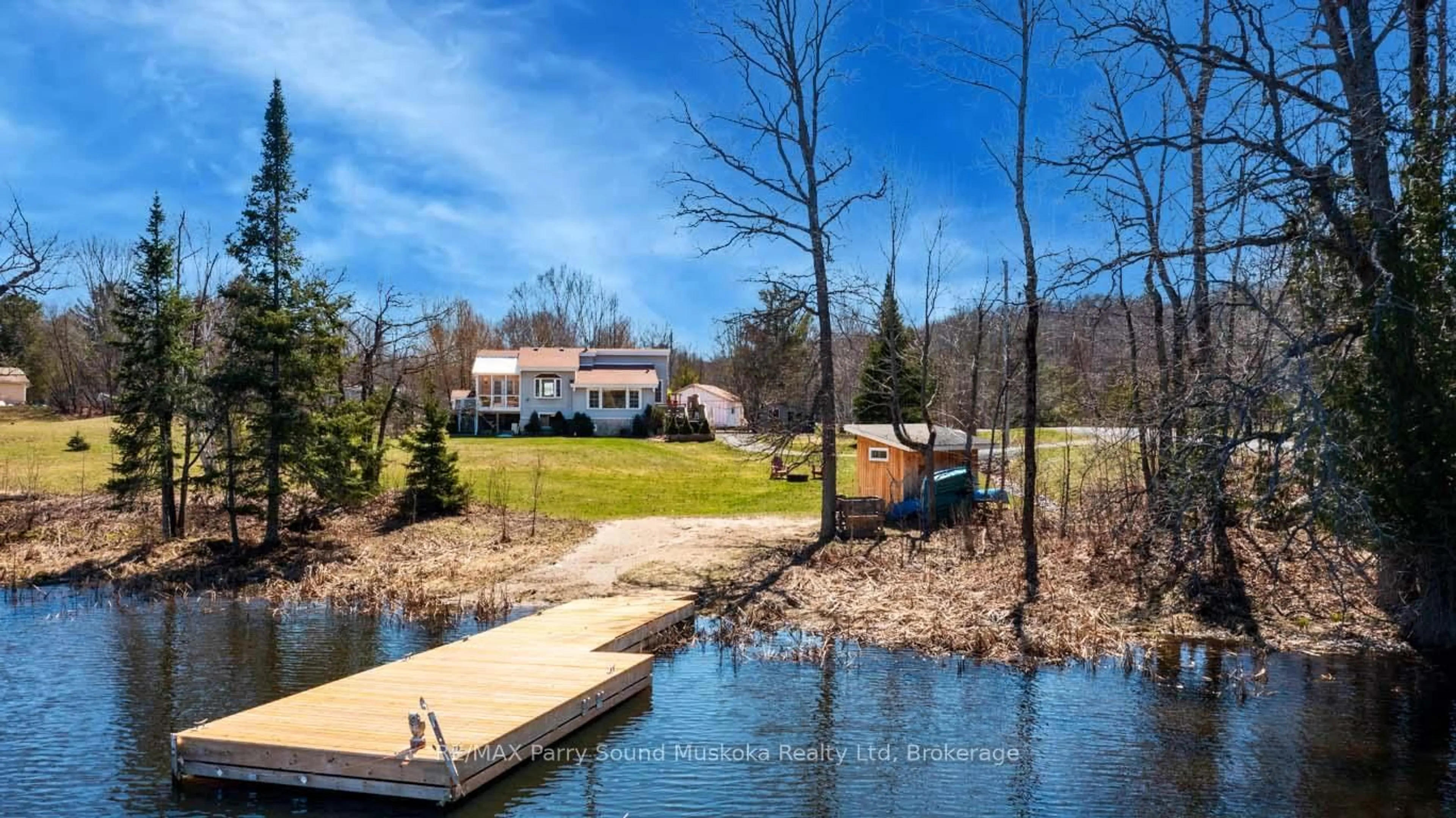 A pic from outside/outdoor area/front of a property/back of a property/a pic from drone, water/lake/river/ocean view for 5 MEHARG Dr, McKellar Ontario P2A 0B5