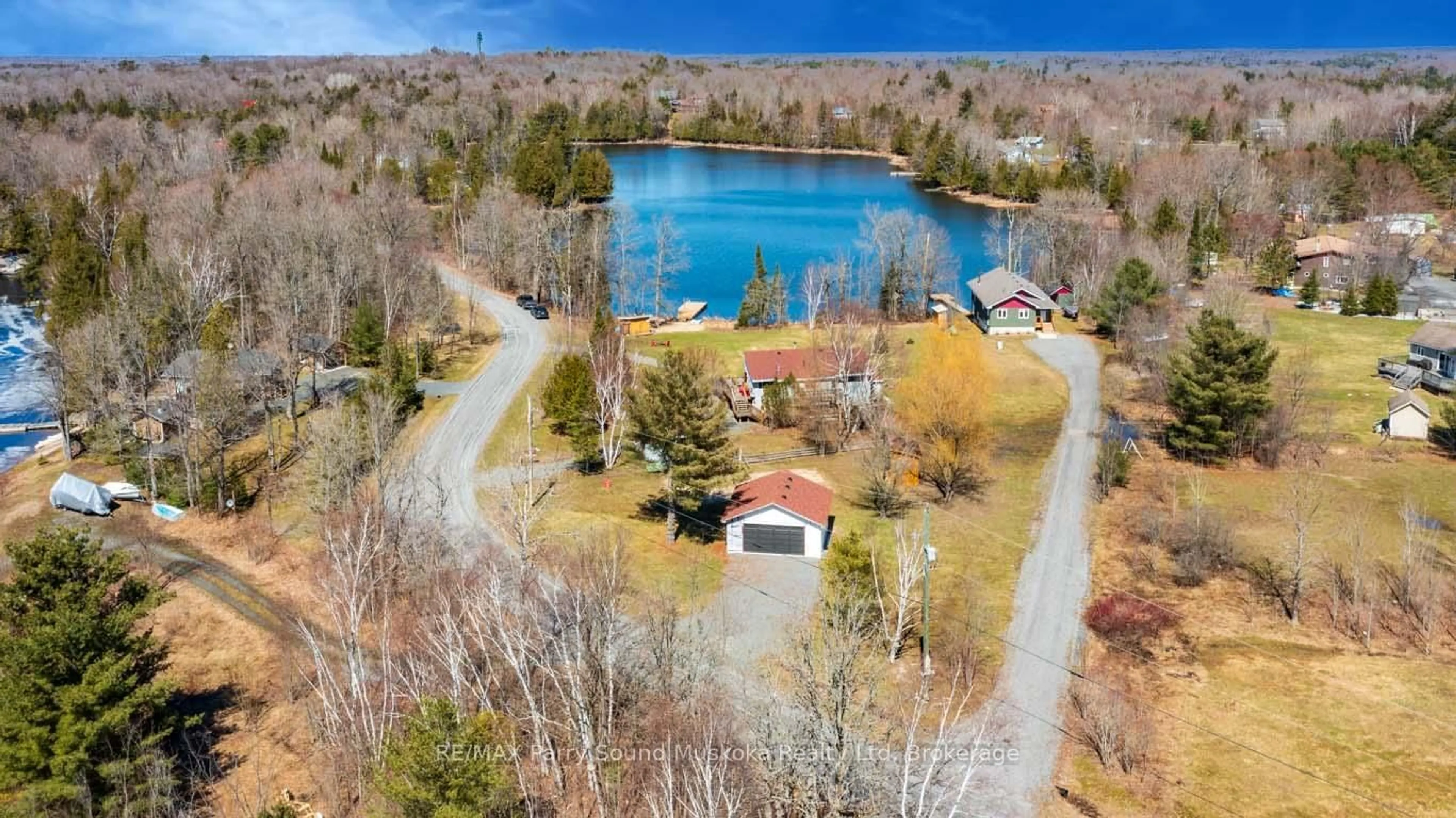 A pic from outside/outdoor area/front of a property/back of a property/a pic from drone, water/lake/river/ocean view for 5 MEHARG Dr, McKellar Ontario P2A 0B5