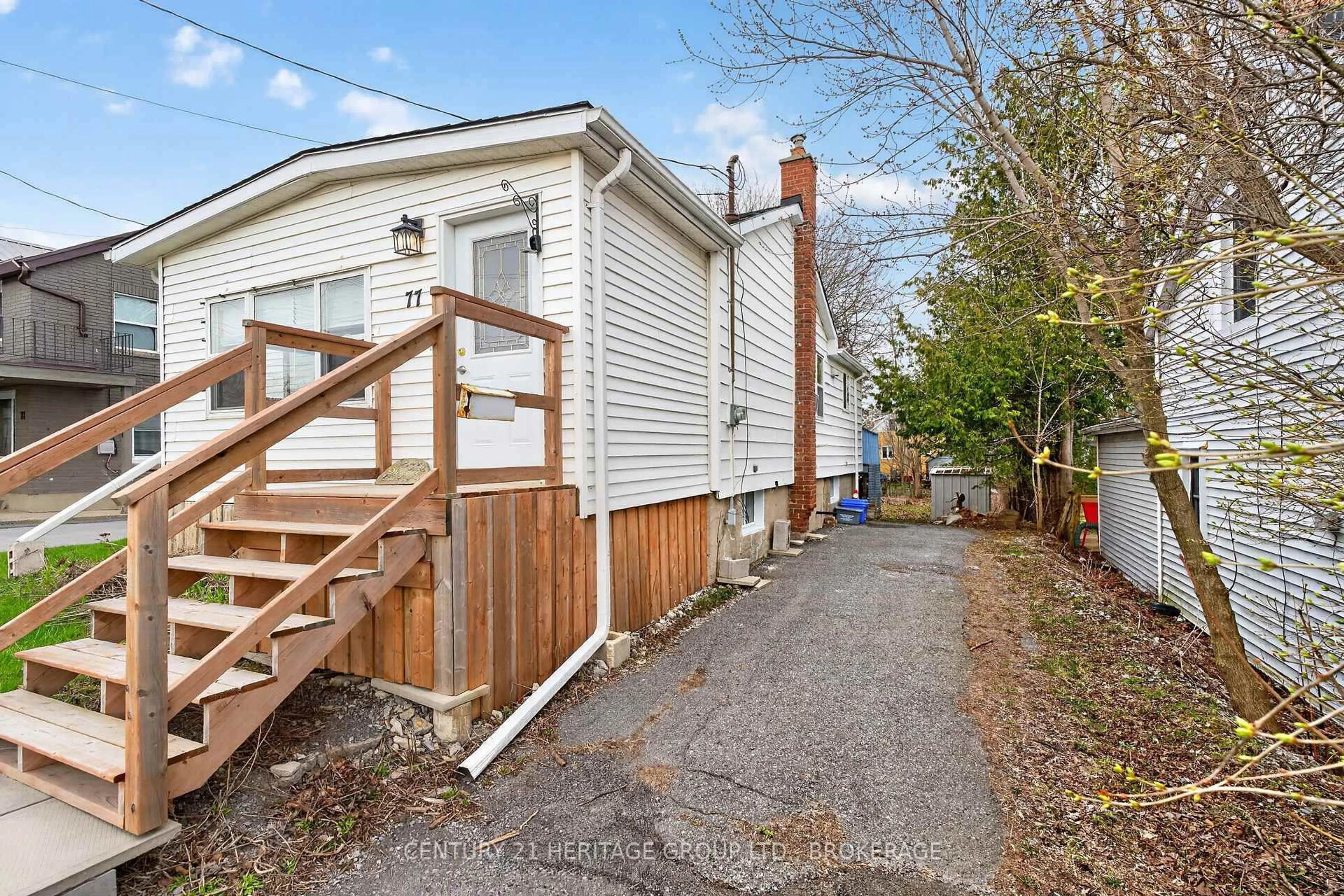 A pic from outside/outdoor area/front of a property/back of a property/a pic from drone, street for 77 Portsmouth Ave, Kingston Ontario K7M 1V4