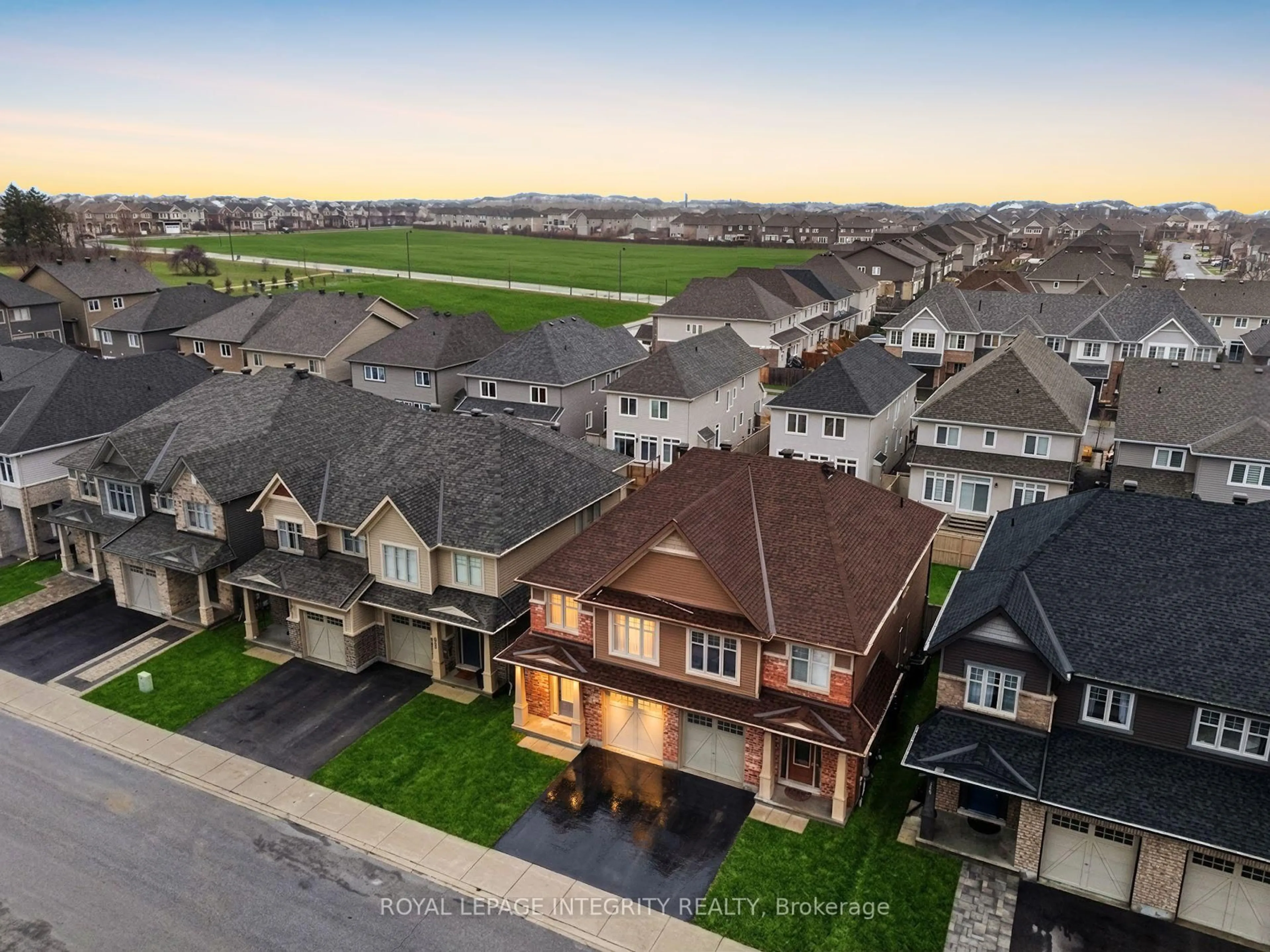 A pic from outside/outdoor area/front of a property/back of a property/a pic from drone, mountain view for 821 Indica St, Ottawa Ontario K2S 2J8