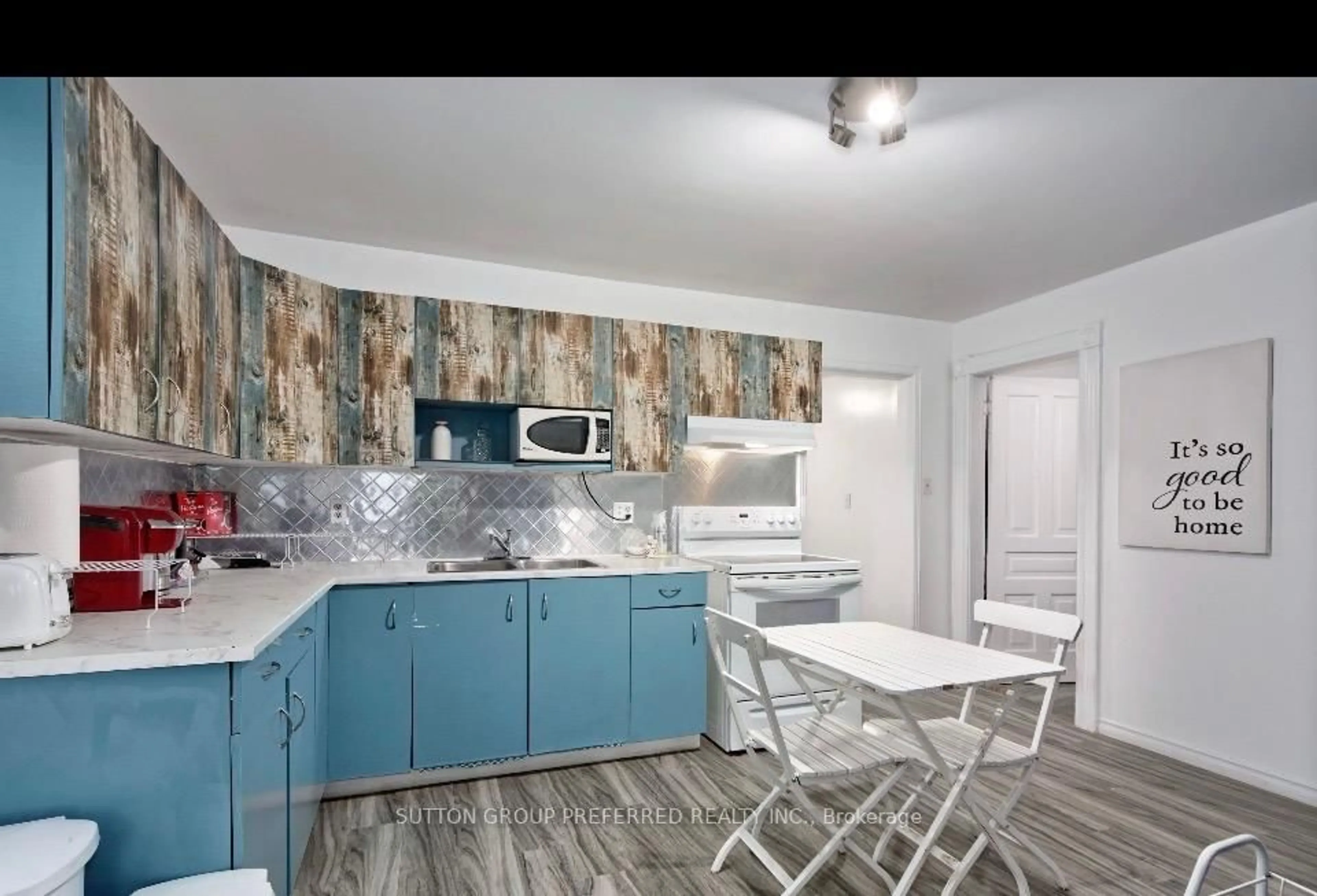 Open concept kitchen, ceramic/tile floor for 173 Adelaide St, London East Ontario N6B 3H1