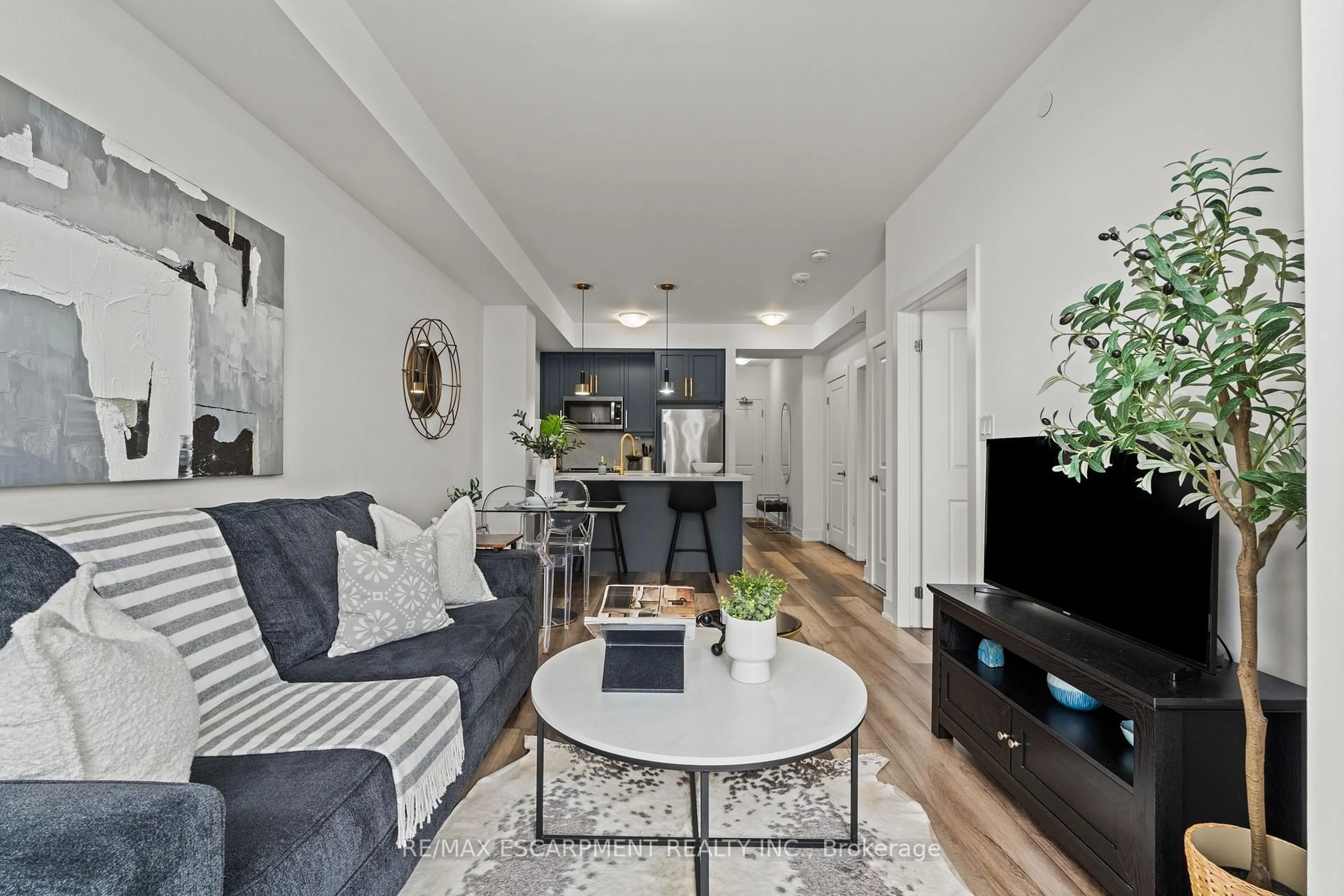 Living room with furniture, unknown for 450 Dundas St #706, Hamilton Ontario L8B 1Z2